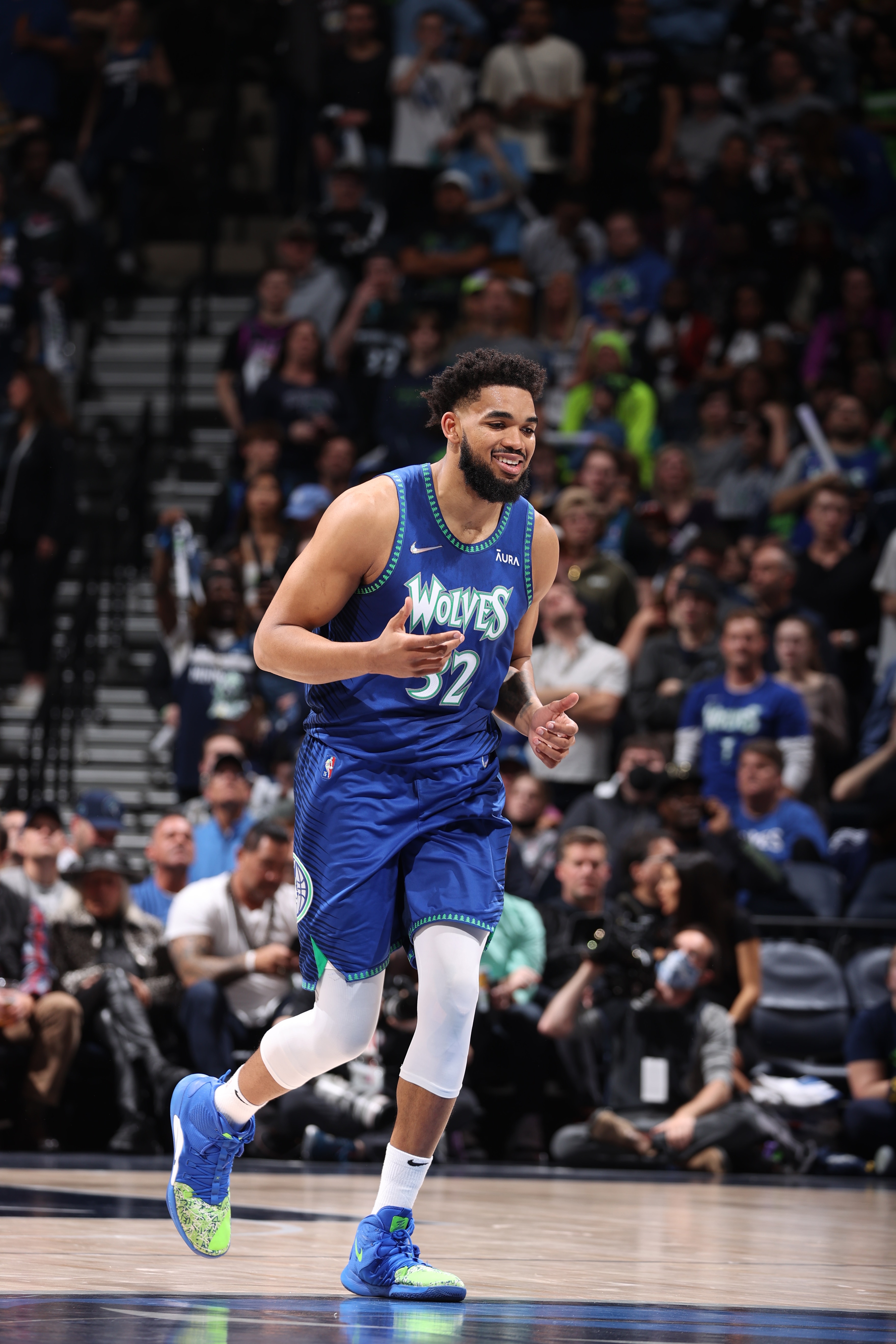 MINNEAPOLIS, MN -  APRIL 29: Karl-Anthony Towns #32 of the Minnesota Timberwolves celebrates against the Memphis Grizzlies during Round 1 Game 6 of the 2022 NBA Playoffs on April 29, 2022 at Target Center in Minneapolis, Minnesota. NOTE TO USER: User expressly acknowledges and agrees that, by downloading and or using this Photograph, user is consenting to the terms and conditions of the Getty Images License Agreement. Mandatory Copyright Notice: Copyright 2022 NBAE (Photo by David Sherman/NBAE via Getty Images)