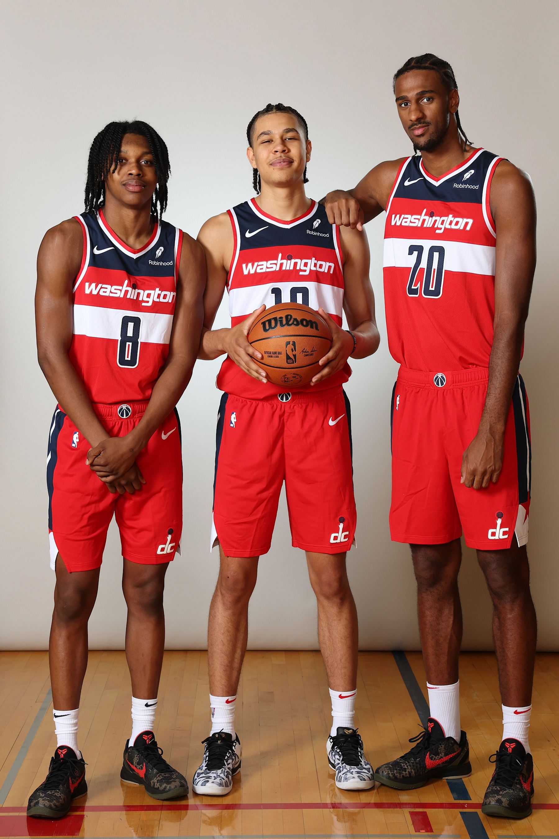 Carlton Carrington, Kyshawn George and Alexandre Sarr