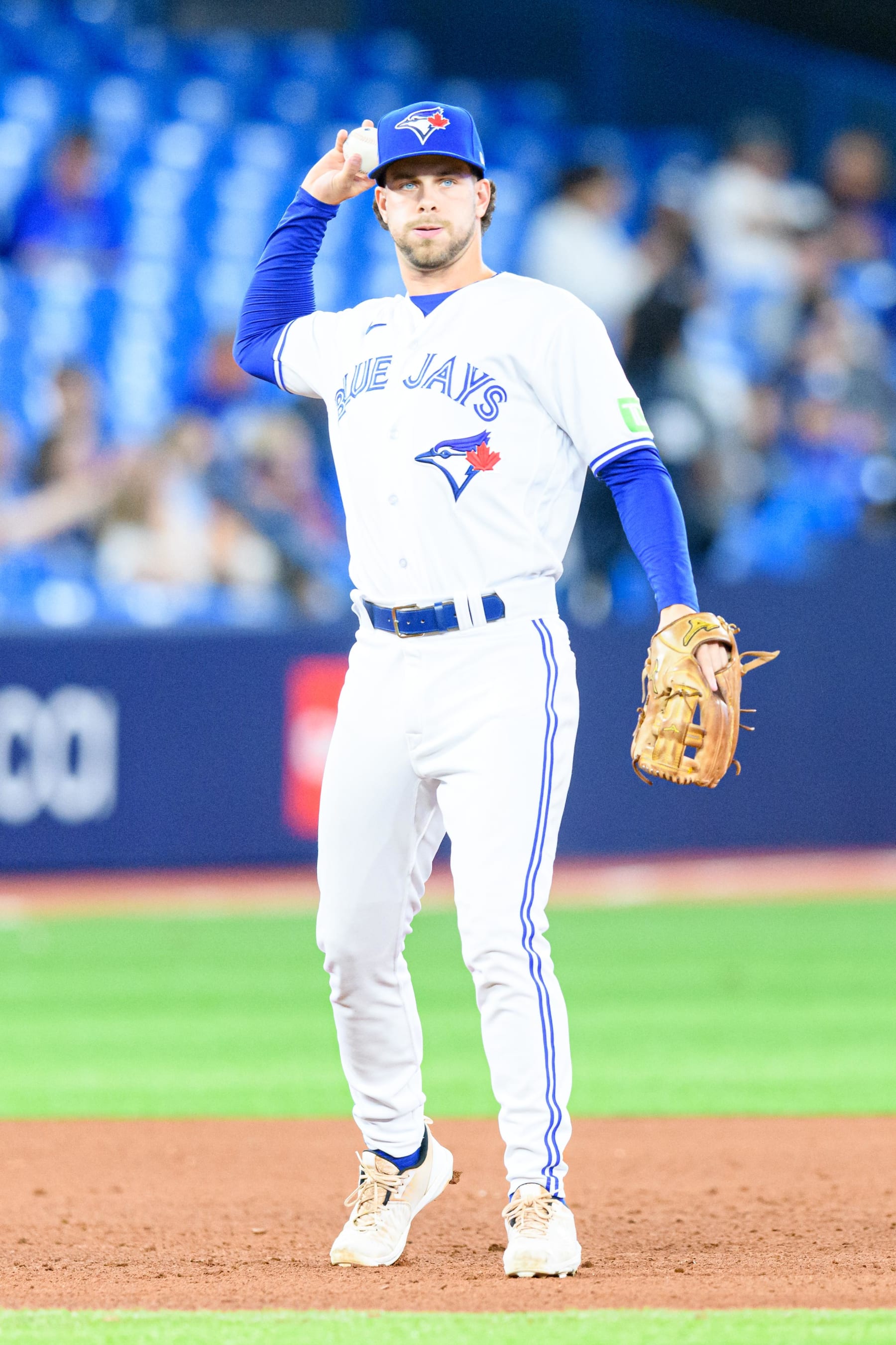 TORONTO, ON - SEPTEMBER 11: Toronto Blue Jays Infield Ernie Clement (28) throws the ball during the MLB baseball regular season game between the Texas Rangers  and the Toronto Blue Jays on September 11, 2023, at Rogers Centre in Toronto, ON, Canada. (Photo by Julian Avram/Icon Sportswire via Getty Images)