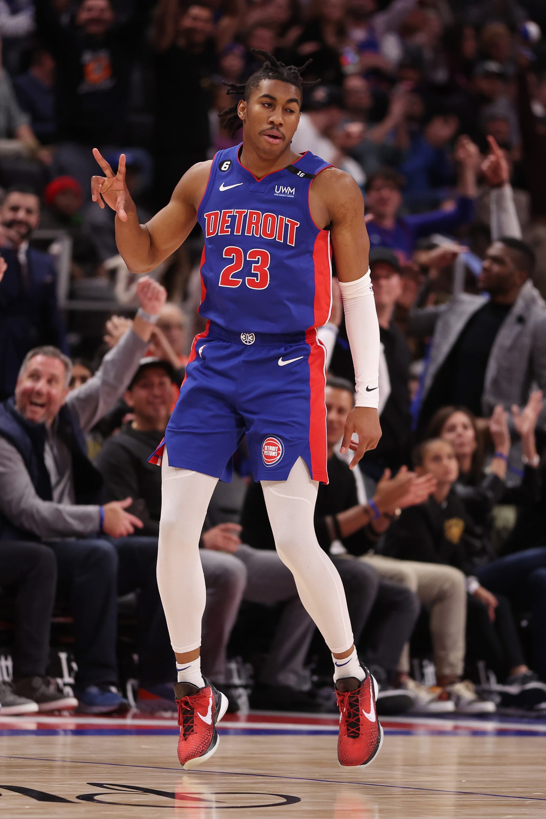DETROIT, MICHIGAN - DECEMBER 01: Jaden Ivey #23 of the Detroit Pistons celebrates his second half three pointer while playing the Dallas Mavericks at Little Caesars Arena on December 01, 2022 in Detroit, Michigan. Detroit won the game 131-125 in overtime. NOTE TO USER: User expressly acknowledges and agrees that, by downloading and or using this photograph, User is consenting to the terms and conditions of the Getty Images License Agreement. (Photo by Gregory Shamus/Getty Images)