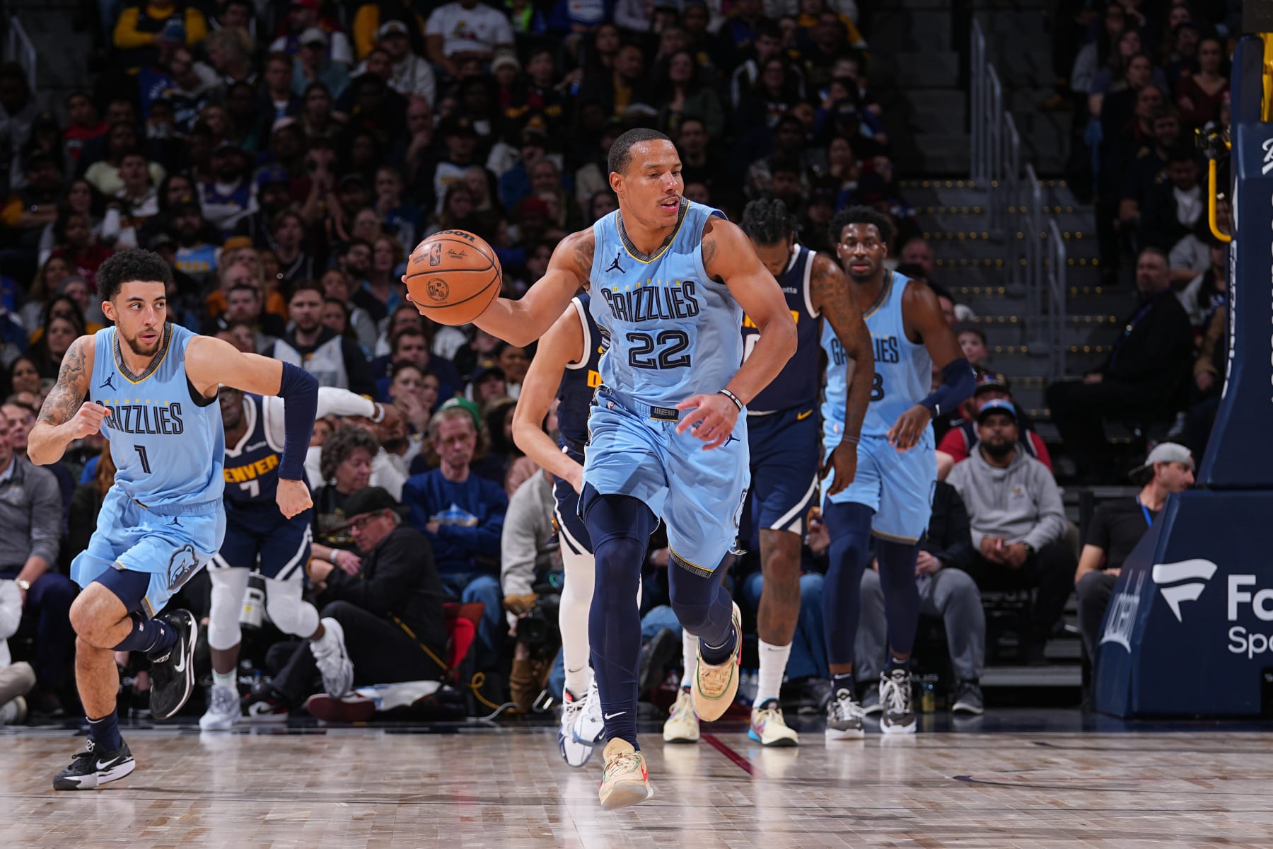 DENVER, CO - MARCH 25: Desmond Bane #22 of the Memphis Grizzlies handles the ball during the game against the Denver Nuggets on March 25, 2024 at the Ball Arena in Denver, Colorado. NOTE TO USER: User expressly acknowledges and agrees that, by downloading and/or using this Photograph, user is consenting to the terms and conditions of the Getty Images License Agreement. Mandatory Copyright Notice: Copyright 2024 NBAE (Photo by Bart Young/NBAE via Getty Images)