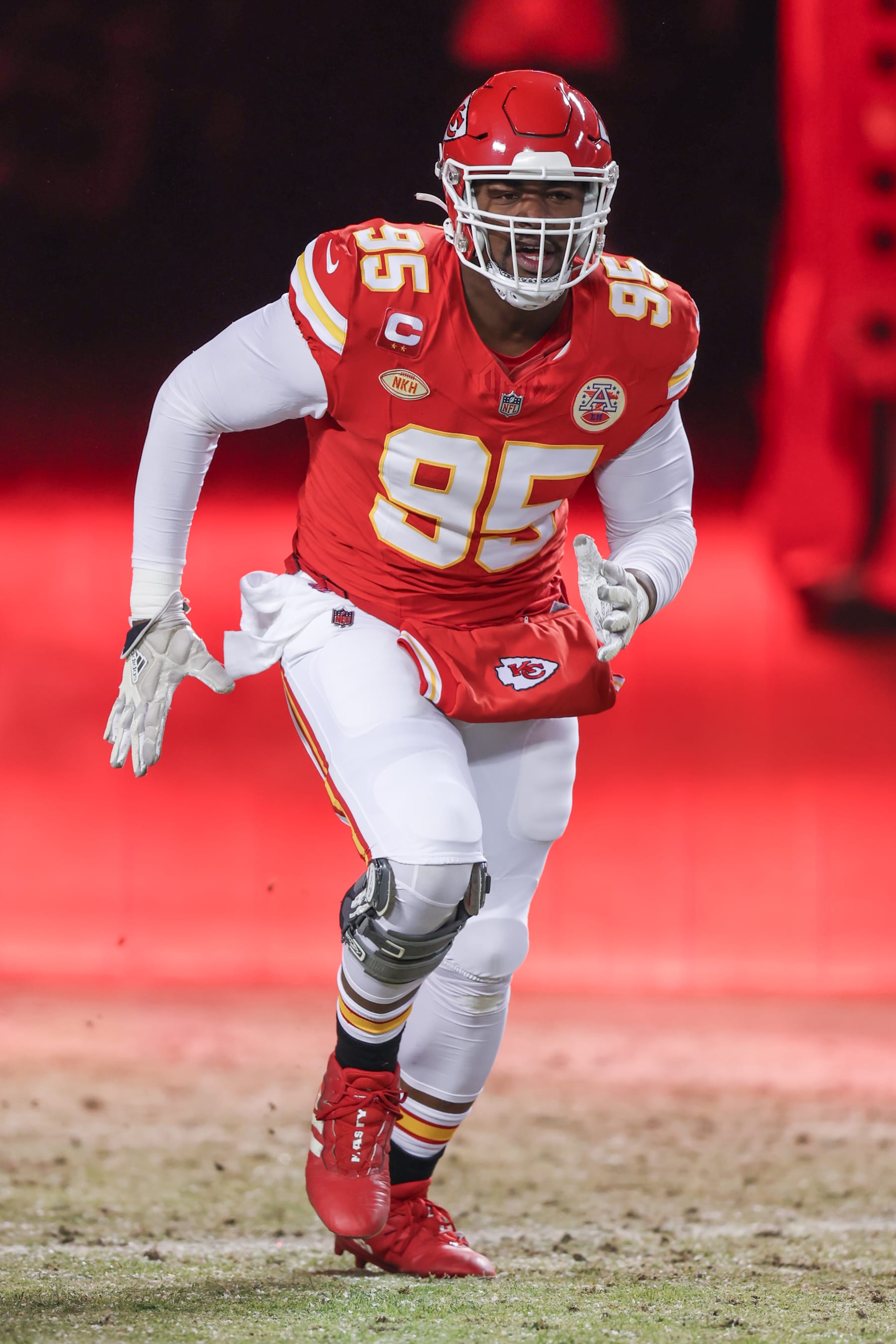 KANSAS CITY, MO - JANUARY 13: Kansas City Chiefs defensive tackle Chris Jones (95) runs onto the field before an AFC Wild Card playoff game between the Miami Dolphins and Kansas City Chiefs on Jan 13, 2024 at GEHA Field at Arrowhead Stadium in Kansas City, MO. (Photo by Scott Winters/Icon Sportswire via Getty Images)