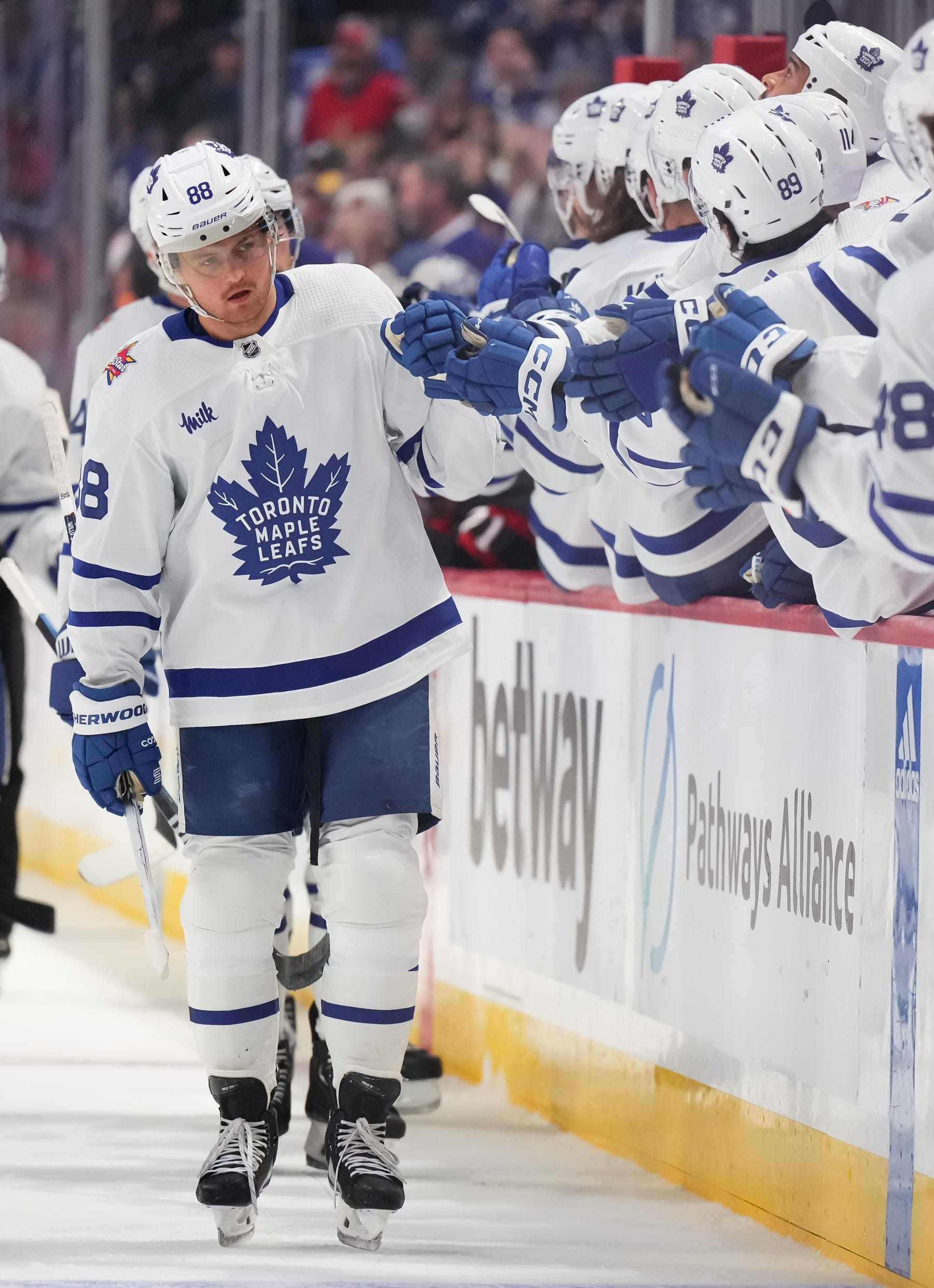 OTTAWA, CANADA - DECEMBER 7:  William Nylander #88 of the Toronto Maple Leafs celebrates his third-period goal against the Ottawa Senators with teammates at the players' bench at Canadian Tire Centre on December 7, 2023 in Ottawa, Ontario, Canada.  (Photo by André Ringuette/NHLI via Getty Images)