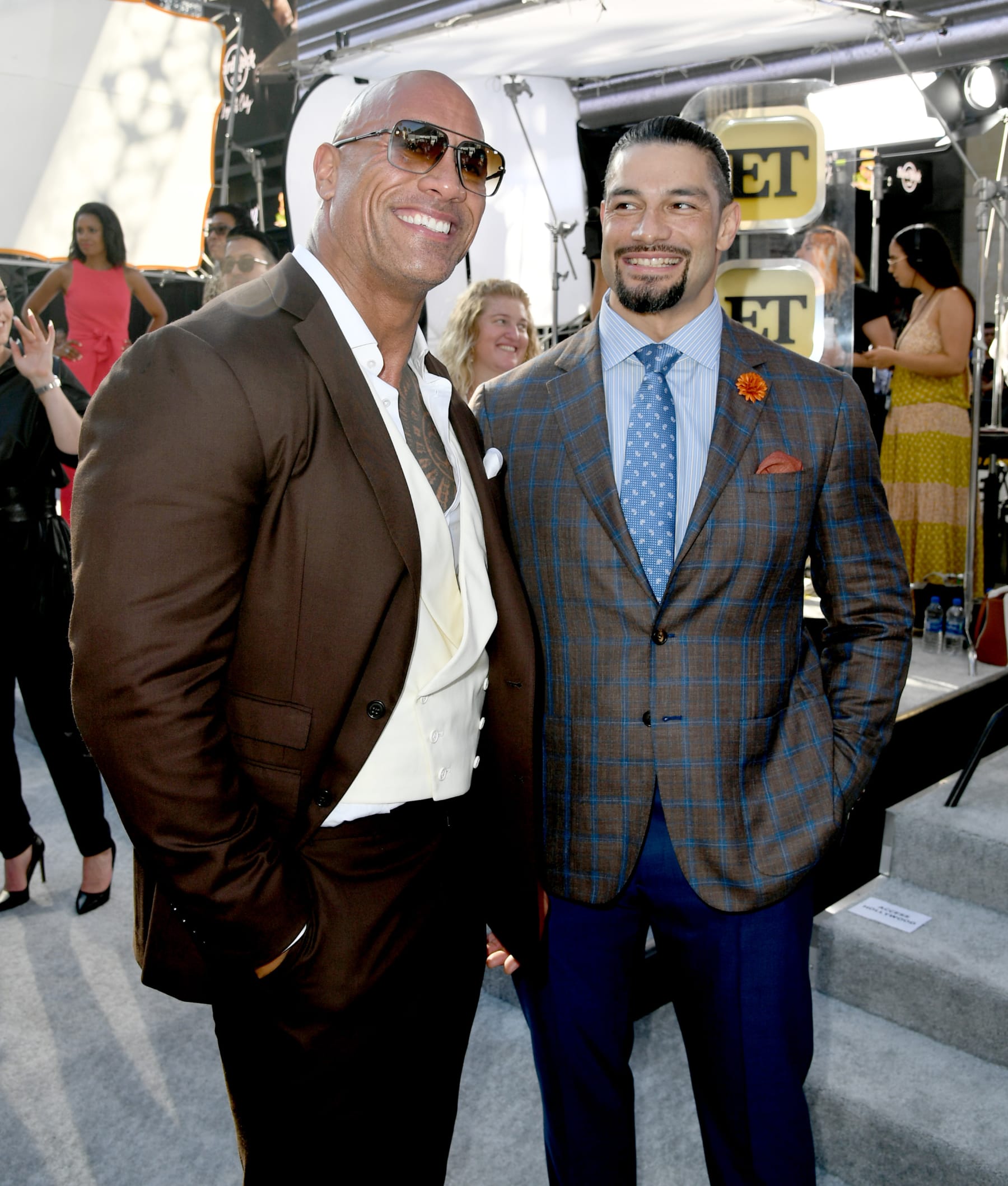 HOLLYWOOD, CALIFORNIA - JULY 13: Dwayne Johnson (L) and Roman Reigns arrive at the premiere of Universal Pictures' "Fast & Furious Presents: Hobbs & Shaw" at Dolby Theatre on July 13, 2019 in Hollywood, California. (Photo by Kevin Winter/Getty Images)
