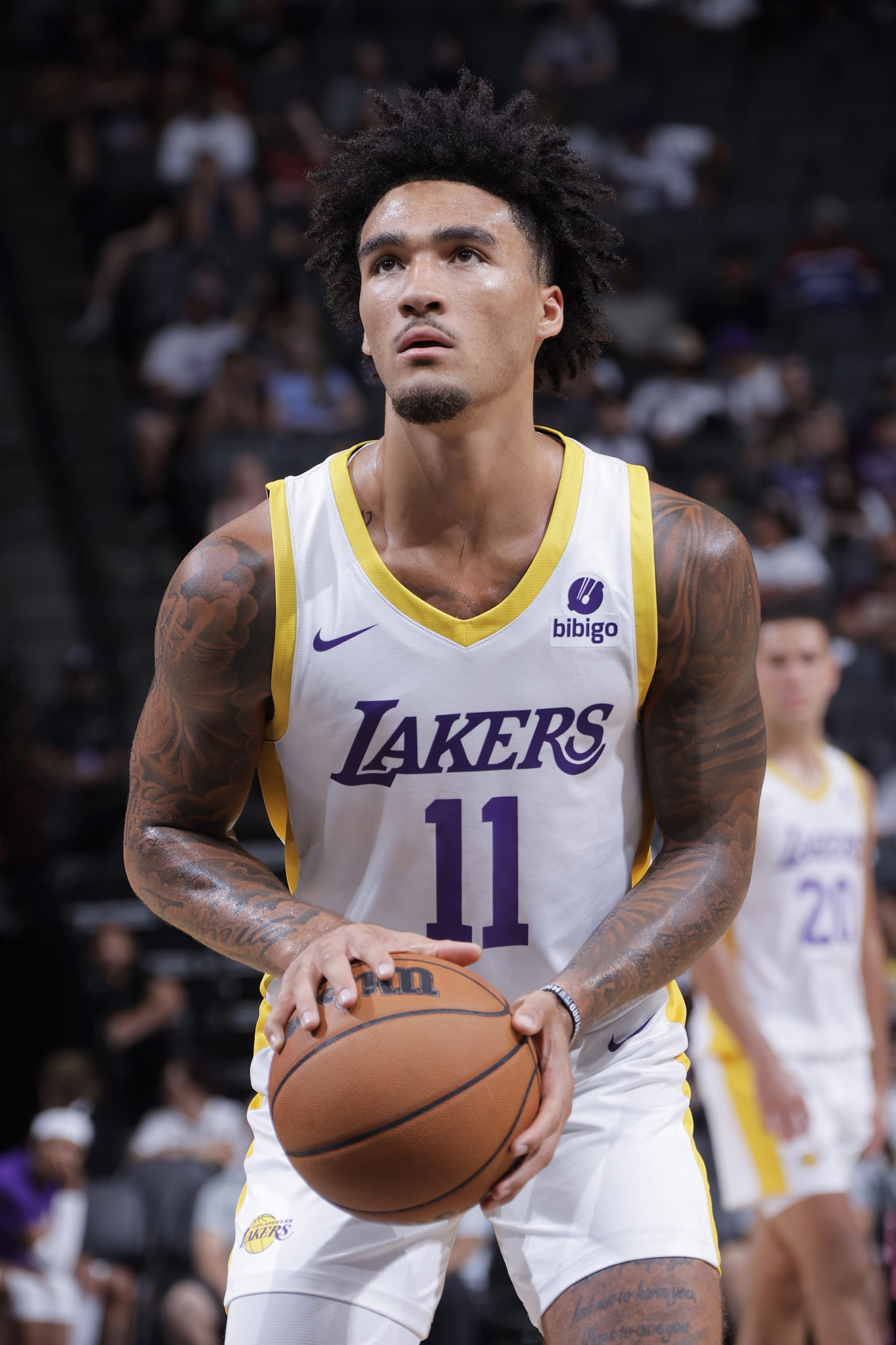 SACRAMENTO, CA - JULY 5: Jalen Hood-Schifino #11 of the Los Angeles Lakers shoots a free throw during the game against the San Antonio Spurs on July 5, 2023 at Golden 1 Center in Sacramento, California. NOTE TO USER: User expressly acknowledges and agrees that, by downloading and or using this Photograph, user is consenting to the terms and conditions of the Getty Images License Agreement. Mandatory Copyright Notice: Copyright 2023 NBAE (Photo by Rocky Widner/NBAE via Getty Images)