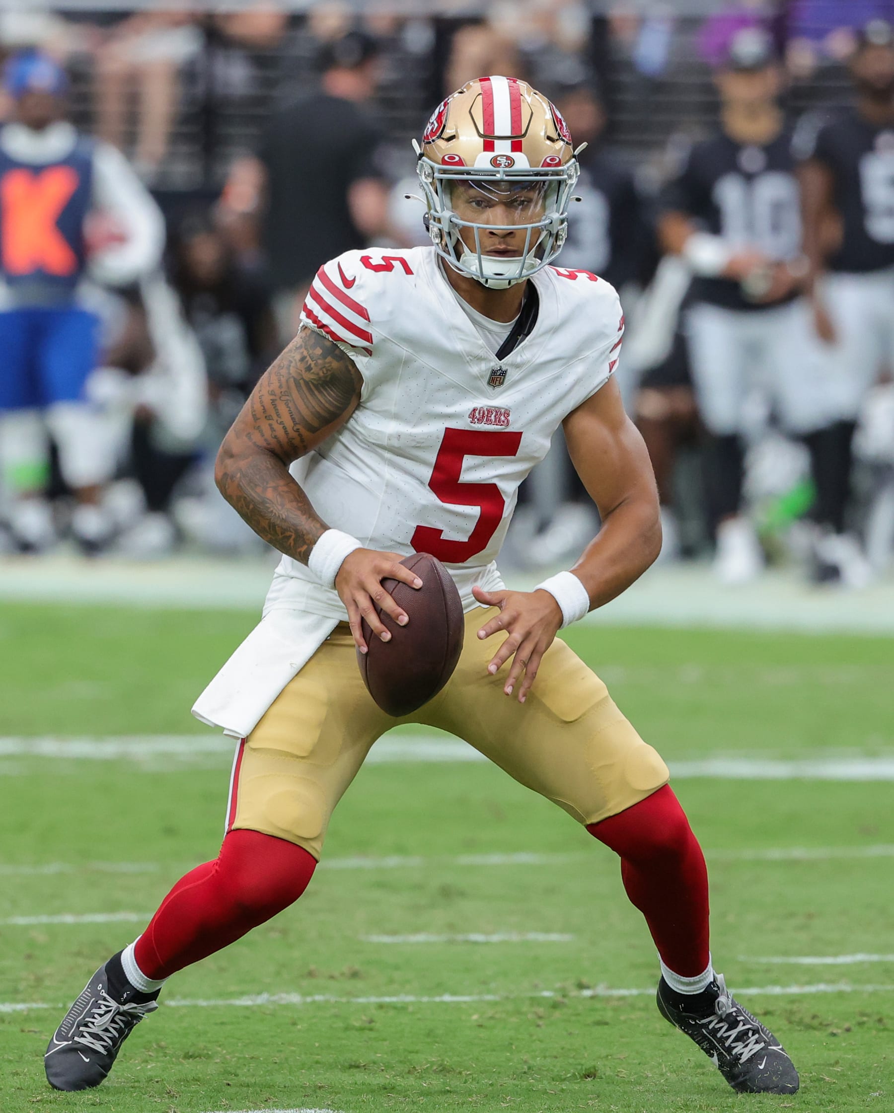 LAS VEGAS, NEVADA - AUGUST 13: Quarterback Trey Lance #5 of the San Francisco 49ers scrambles against the Las Vegas Raiders in the second quarter of a preseason game at Allegiant Stadium on August 13, 2023 in Las Vegas, Nevada. The Raiders defeated the 49ers 34-7. (Photo by Ethan Miller/Getty Images)