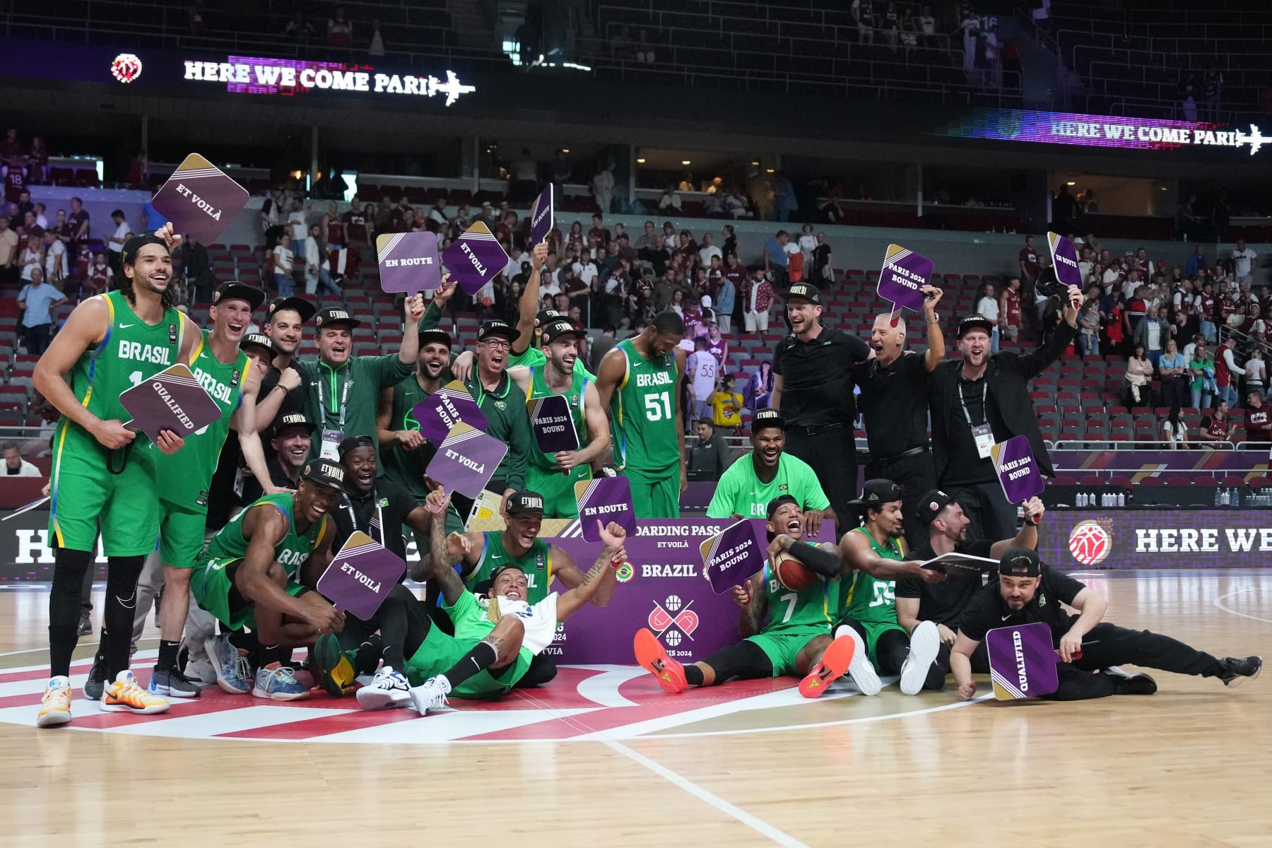 Members of Team Brazil celebrate after winning the FIBA Men's Olympic Qualifying Tournament 2024 final match between Latvia and Brazil in Riga, Latvia, July 7, 2024. (Photo by Edijs Palens/Xinhua via Getty Images)