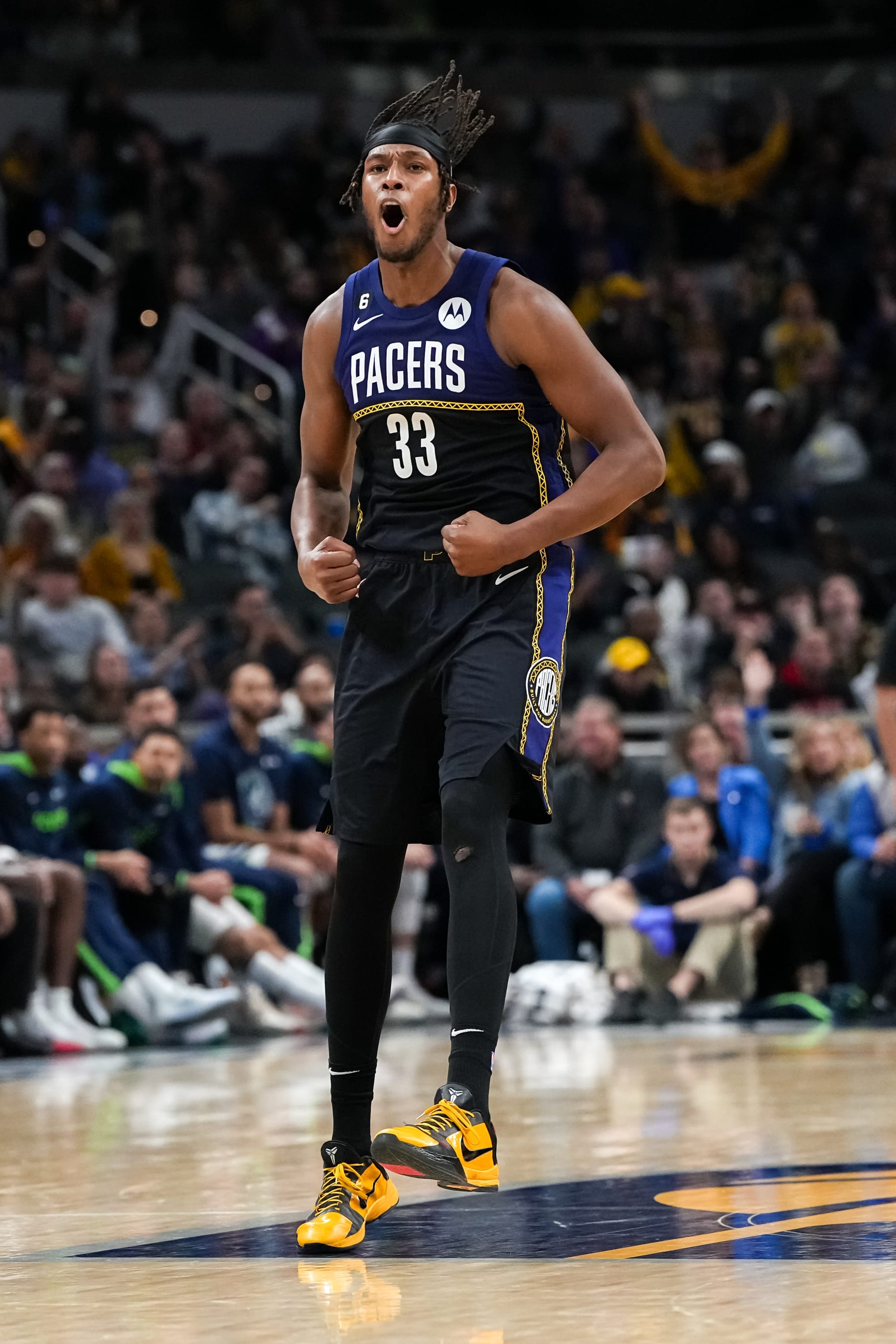 INDIANAPOLIS, INDIANA - NOVEMBER 23: Myles Turner #33 of the Indiana Pacers reacts after making a shot in the third quarter against the Minnesota Timberwolves at Gainbridge Fieldhouse on November 23, 2022 in Indianapolis, Indiana. NOTE TO USER: User expressly acknowledges and agrees that, by downloading and or using this photograph, User is consenting to the terms and conditions of the Getty Images License Agreement. (Photo by Dylan Buell/Getty Images)