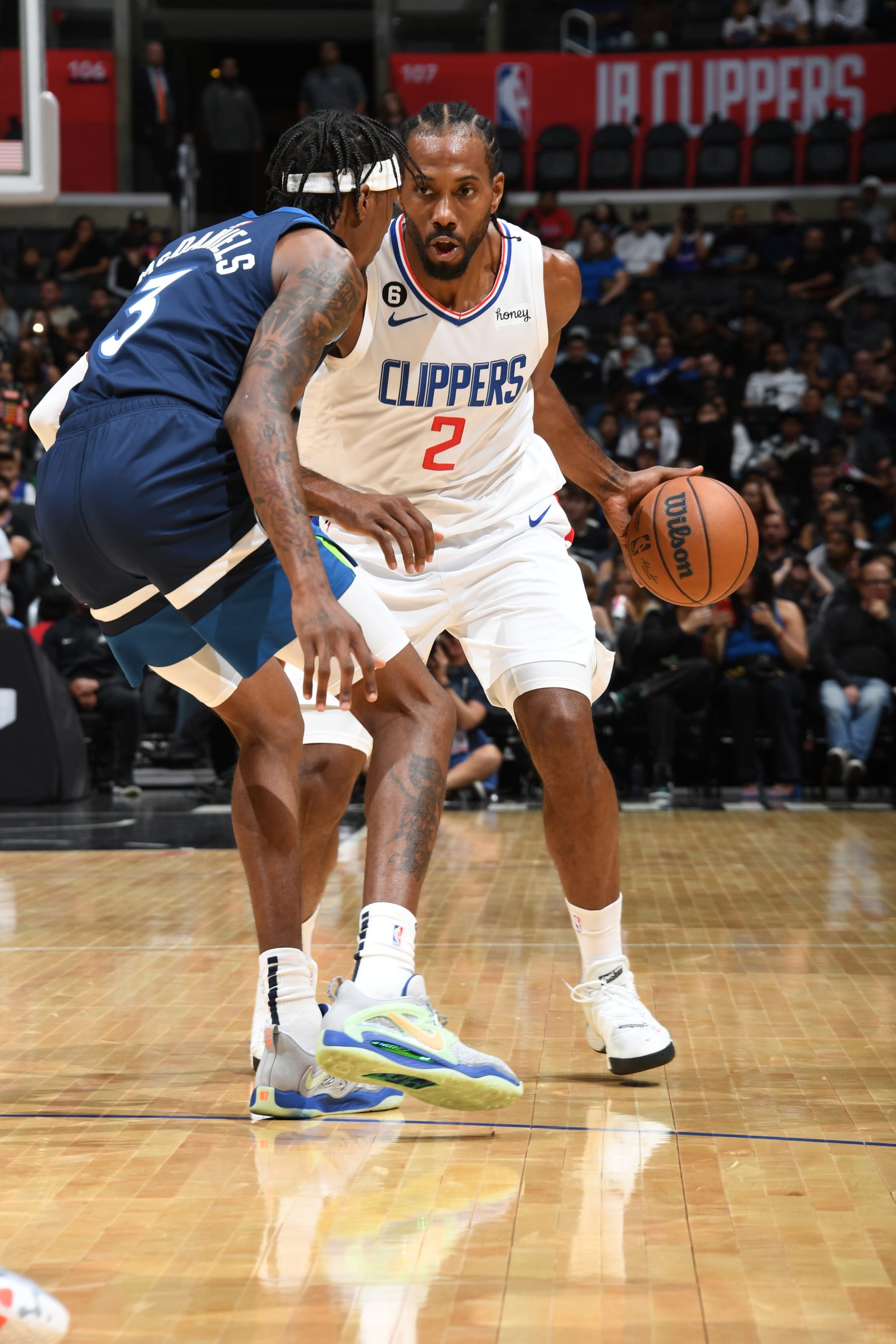 LOS ANGELES, CA - OCTOBER 9: Kawhi Leonard #2 of the LA Clippers dribbles the ball against the Minnesota Timberwolves during a preseason game on October 9, 2022 at Crypto.com Arena in Los Angeles, California. NOTE TO USER: User expressly acknowledges and agrees that, by downloading and/or using this Photograph, user is consenting to the terms and conditions of the Getty Images License Agreement. Mandatory Copyright Notice: Copyright 2022 NBAE (Photo by Andrew D. Bernstein/NBAE via Getty Images)