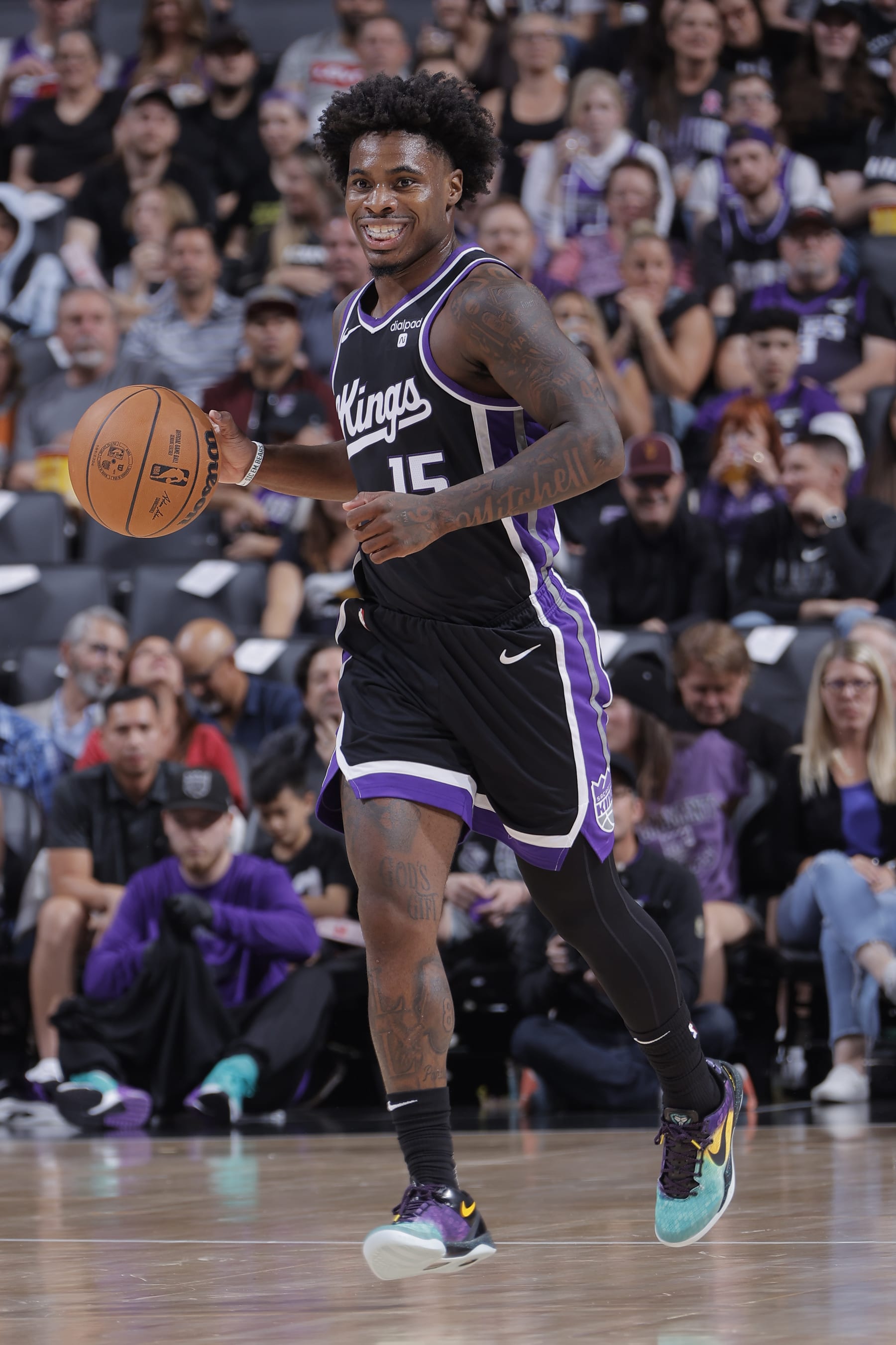 SACRAMENTO, CA - OCTOBER 19: Davion Mitchell #15 of the Sacramento Kings dribbles the ball during the game against the Utah Jazz on October 19, 2023 at Golden 1 Center in Sacramento, California. NOTE TO USER: User expressly acknowledges and agrees that, by downloading and or using this Photograph, user is consenting to the terms and conditions of the Getty Images License Agreement. Mandatory Copyright Notice: Copyright 2023 NBAE (Photo by Rocky Widner/NBAE via Getty Images)