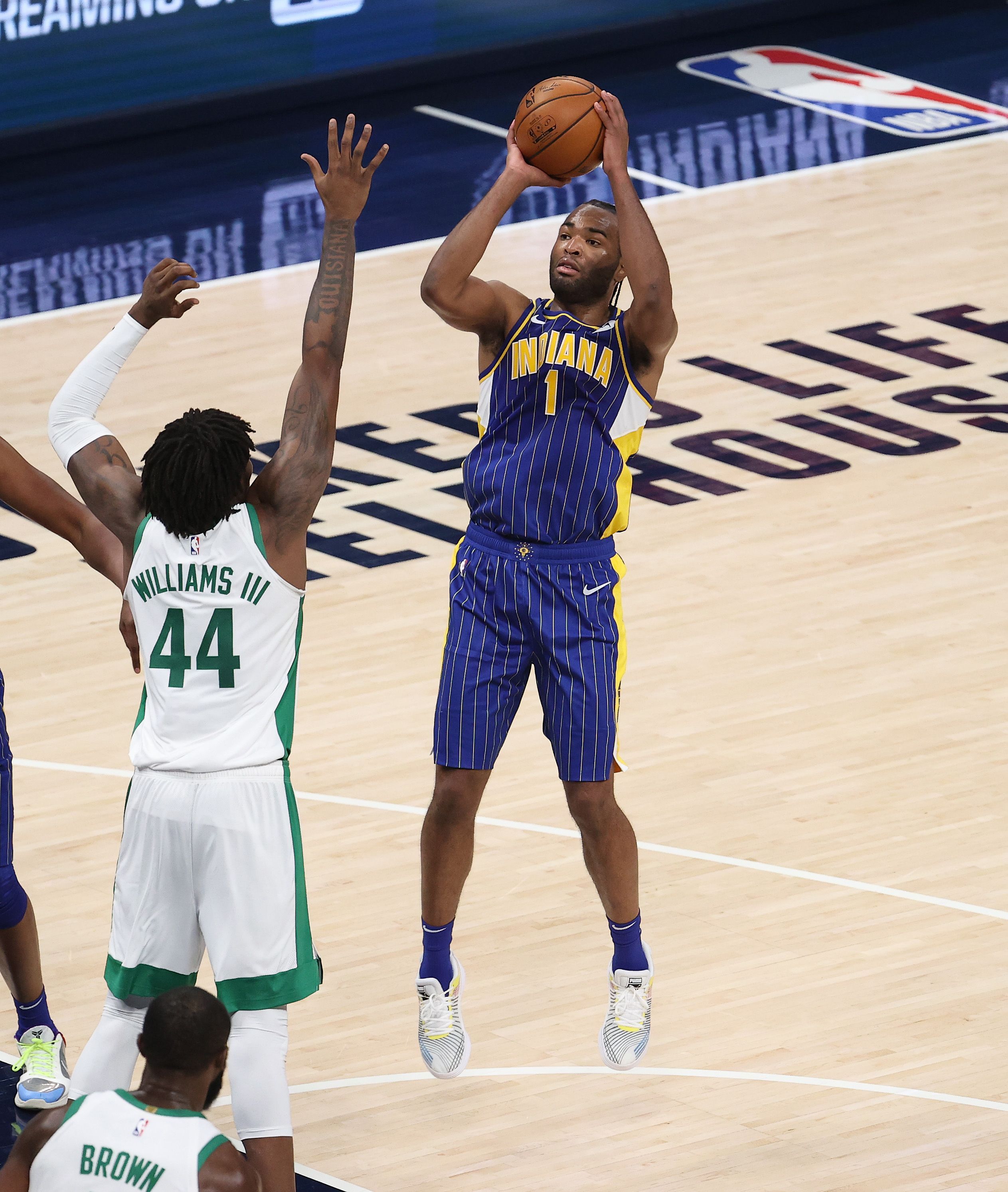 INDIANAPOLIS, INDIANA - DECEMBER 27:  T.J. Warren #1 of the Indiana Pacers shoots the ball against the Boston Celtics at Bankers Life Fieldhouse on December 27, 2020 in Indianapolis, Indiana.  NOTE TO USER: User expressly acknowledges and agrees that, by downloading and or using this photograph, User is consenting to the terms and conditions of the Getty Images License Agreement.    (Photo by Andy Lyons/Getty Images)