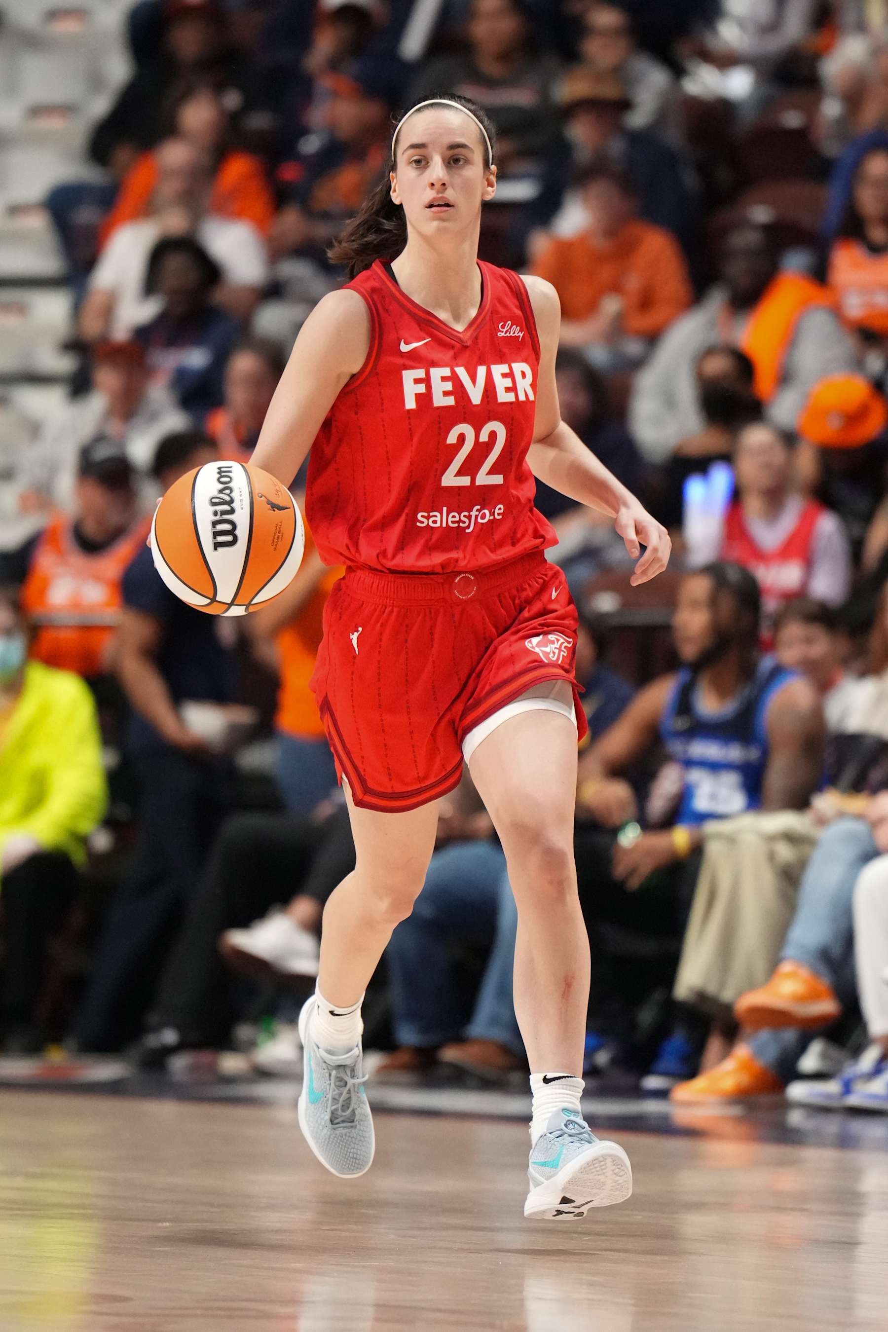 UNCASVILLE, CT - SEPTEMBER 25: Caitlin Clark #22 of the Indiana Fever dribbles the ball during the game against the Connecticut Sun during Round one Game two of the 2024 WNBA Playoffs on September 25, 2024 at the Mohegan Sun Arena in Uncasville, Connecticut. NOTE TO USER: User expressly acknowledges and agrees that, by downloading and or using this photograph, User is consenting to the terms and conditions of the Getty Images License Agreement. Mandatory Copyright Notice: Copyright 2024 NBAE (Photo by Jesse D. Garrabrant/NBAE via Getty Images)