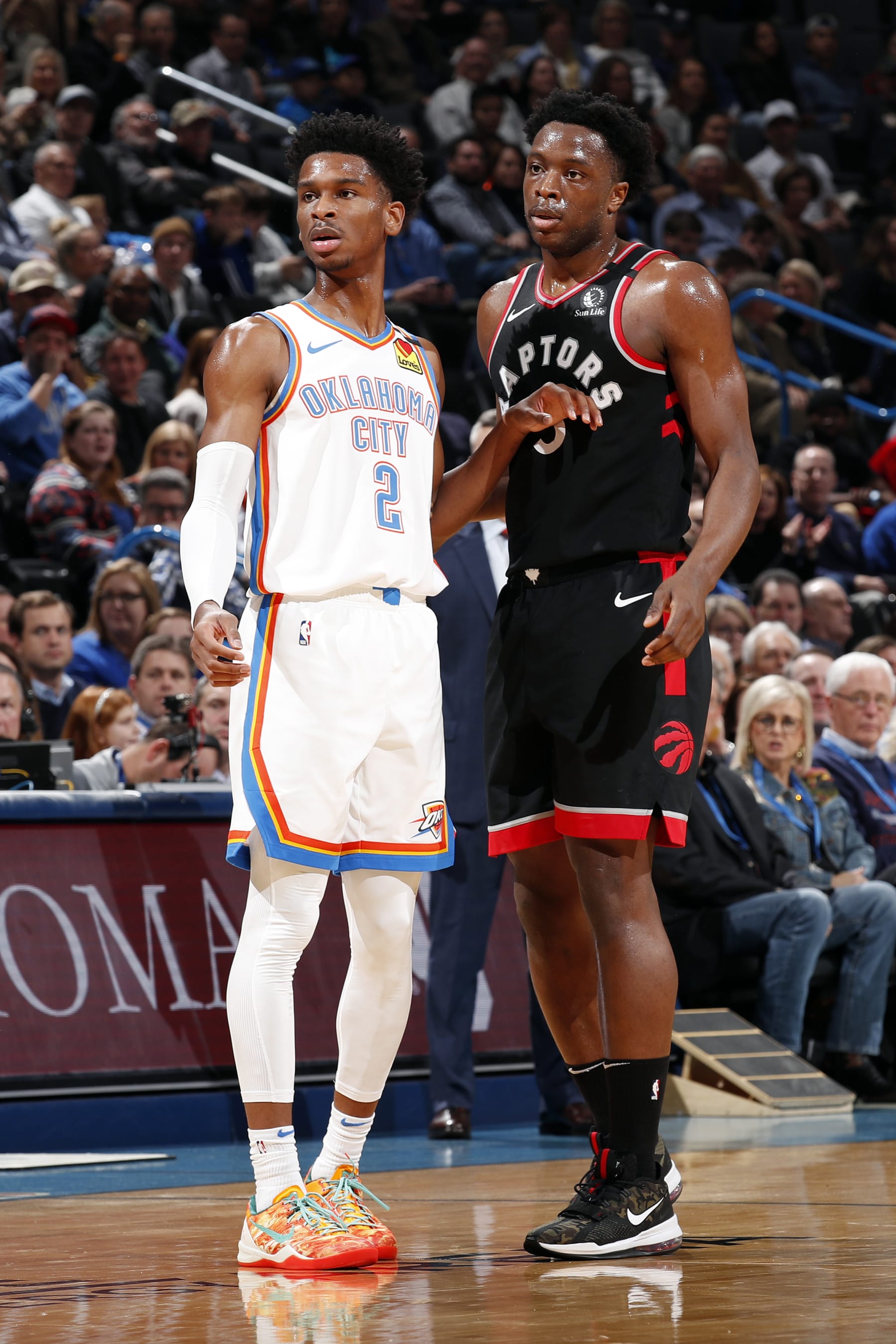 OKLAHOMA CITY, OK - JANUARY 15: Shai Gilgeous-Alexander #2 of the Oklahoma City Thunder and OG Anunoby #3 of the Toronto Raptors fight for position during the game on January 15, 2020 at Chesapeake Energy Arena in Oklahoma City, Oklahoma. NOTE TO USER: User expressly acknowledges and agrees that, by downloading and or using this photograph, User is consenting to the terms and conditions of the Getty Images License Agreement. Mandatory Copyright Notice: Copyright 2020 NBAE (Photo by Jeff Haynes/NBAE via Getty Images)