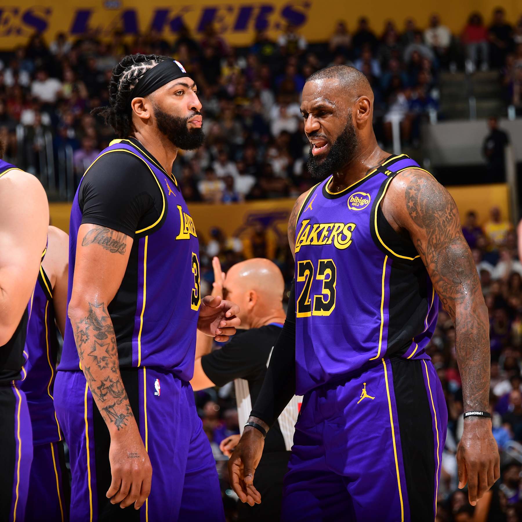 LOS ANGELES, CA - OCTOBER 25: Anthony Davis #3 and LeBron James #23 of the Los Angeles Lakers talk during the game against the Phoenix Suns on October 25, 2024 at Crypto.Com Arena in Los Angeles, California. NOTE TO USER: User expressly acknowledges and agrees that, by downloading and/or using this Photograph, user is consenting to the terms and conditions of the Getty Images License Agreement. Mandatory Copyright Notice: Copyright 2024 NBAE (Photo by Adam Pantozzi/NBAE via Getty Images)