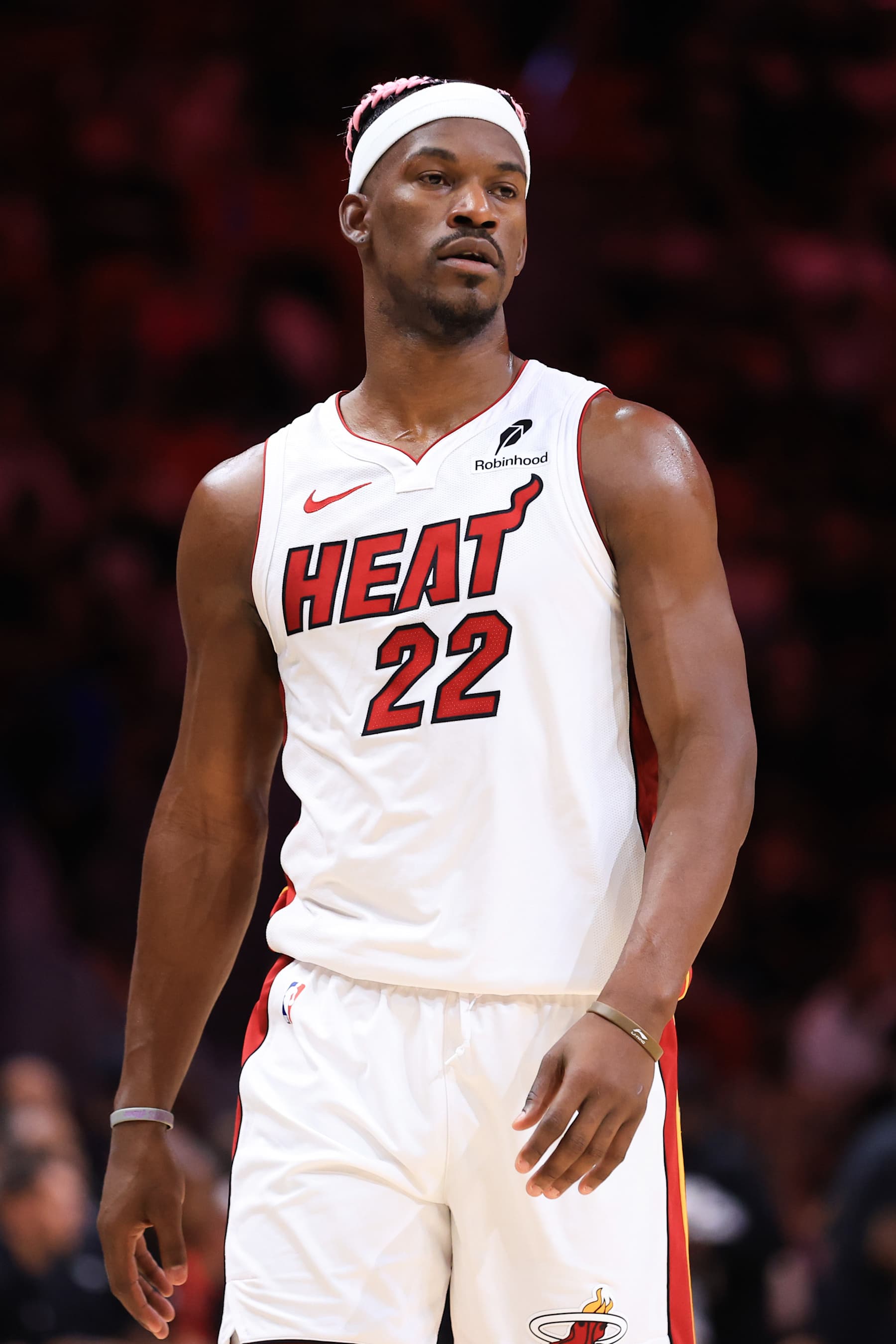 MIAMI, FLORIDA - JANUARY 01: Jimmy Butler #22 of the Miami Heat looks on against the New Orleans Pelicans during the second quarter of the game at Kaseya Center on January 01, 2025 in Miami, Florida. NOTE TO USER: User expressly acknowledges and agrees that, by downloading and or using this photograph, User is consenting to the terms and conditions of the Getty Images License Agreement. (Photo by Megan Briggs/Getty Images)