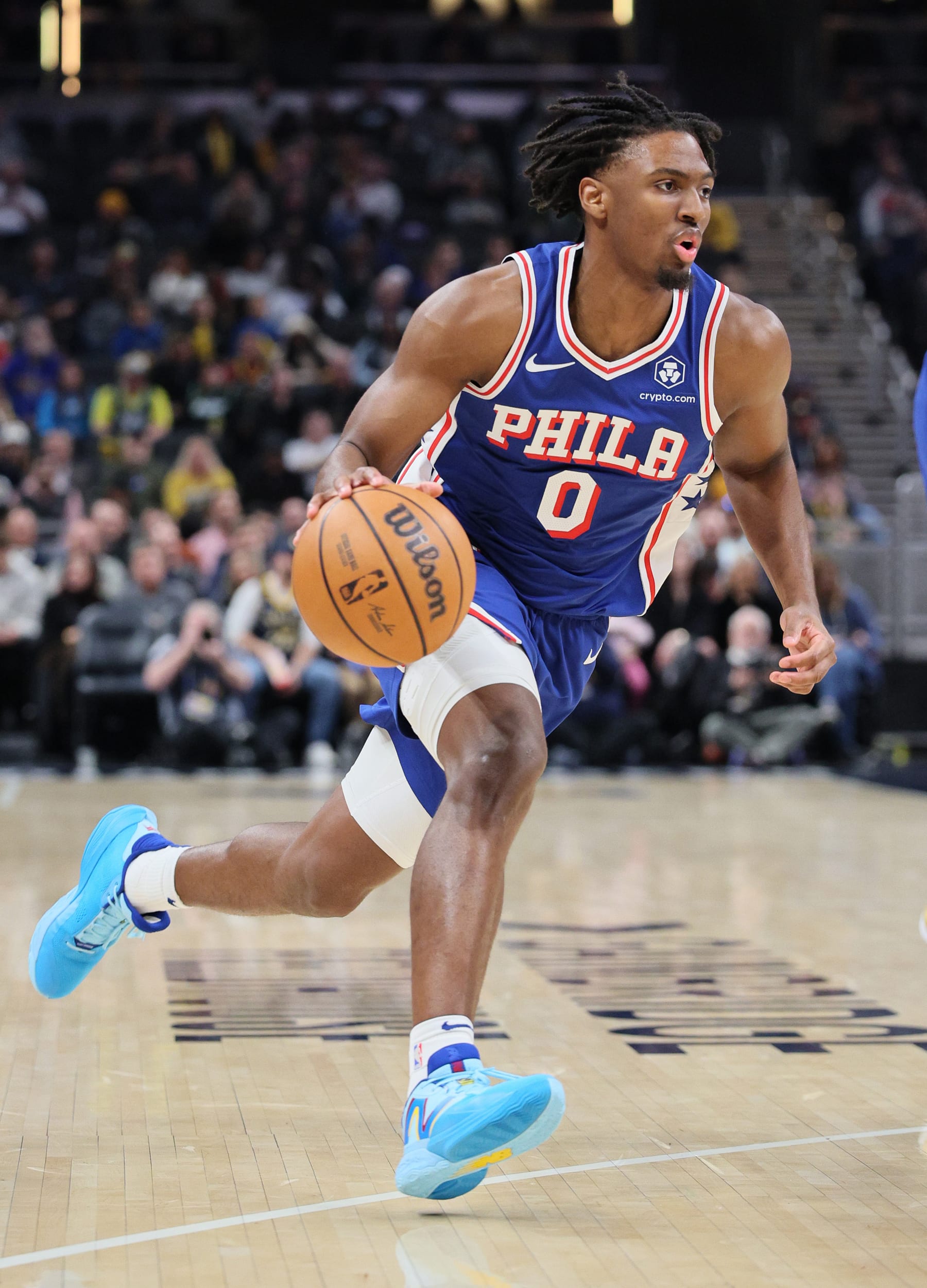 INDIANAPOLIS, INDIANA - JANUARY 25: Tyrese Maxey #0 of the Philadelphia 76ers dribbles the ball in the first half against the Indiana Pacers at Gainbridge Fieldhouse on January 25, 2024 in Indianapolis, Indiana.    NOTE TO USER: User expressly acknowledges and agrees that, by downloading and or using this photograph, User is consenting to the terms and conditions of the Getty Images License Agreement.  (Photo by Andy Lyons/Getty Images)