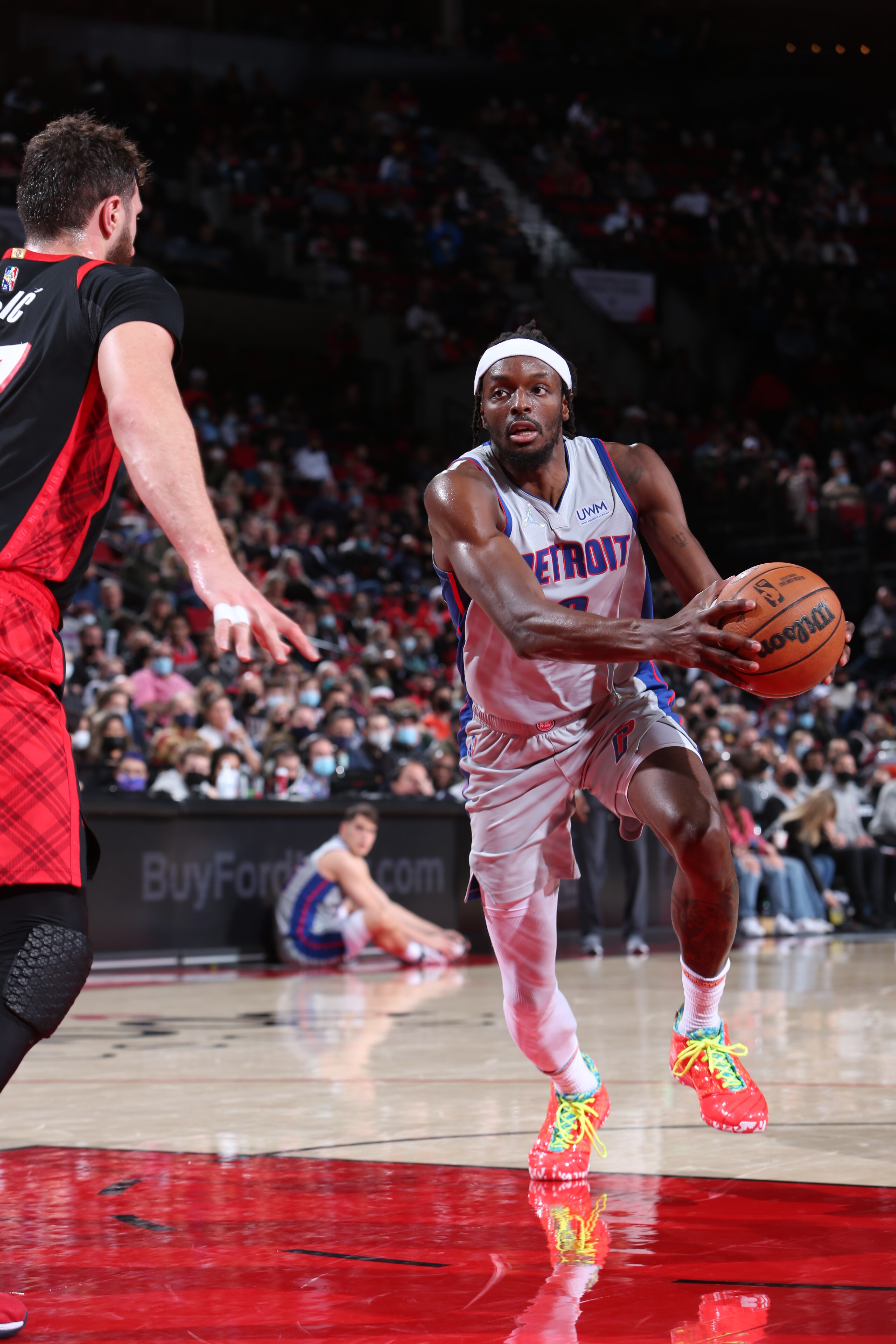 PORTLAND, OR - NOVEMBER 30: Jerami Grant #9 of the Detroit Pistons drives to the basket against the Portland Trail Blazers on November 30, 2021at the Moda Center Arena in Portland, Oregon. NOTE TO USER: User expressly acknowledges and agrees that, by downloading and or using this photograph, user is consenting to the terms and conditions of the Getty Images License Agreement. Mandatory Copyright Notice: Copyright 2021 NBAE (Photo by Sam Forencich/NBAE via Getty Images)