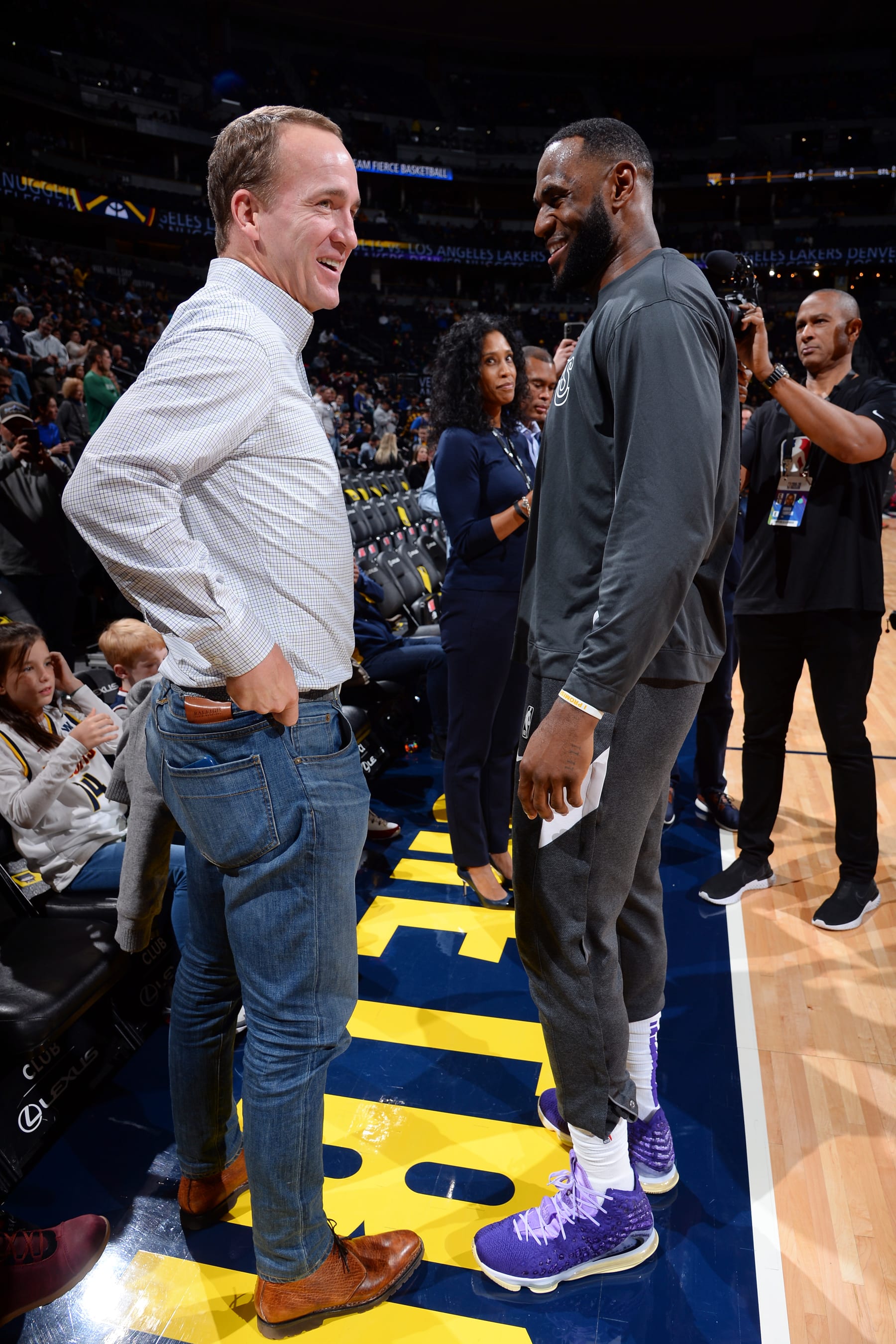 DENVER, CO - DECEMBER 3: NFL Legend Peyton Manning talks with LeBron James #23 of the Los Angeles Lakers before the game against the Denver Nuggets on December 3, 2019 at the Pepsi Center in Denver, Colorado. NOTE TO USER: User expressly acknowledges and agrees that, by downloading and/or using this Photograph, user is consenting to the terms and conditions of the Getty Images License Agreement. Mandatory Copyright Notice: Copyright 2019 NBAE (Photo by Bart Young/NBAE via Getty Images)