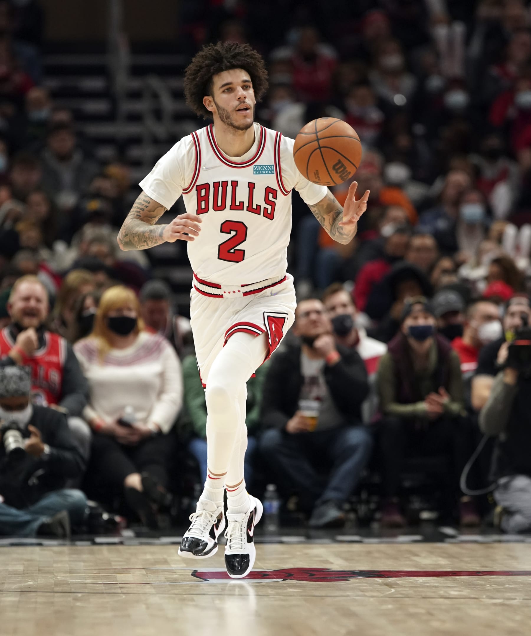 CHICAGO, ILLINOIS - DECEMBER 20: Lonzo Ball #2 of the Chicago Bulls brings the ball up the court against the Houston Rockets at the United Center on December 20, 2021 in Chicago, Illinois. NOTE TO USER: User expressly acknowledges and agrees that, by downloading and or using this photograph, User is consenting to the terms and conditions of the Getty Images License Agreement. (Photo by Nuccio DiNuzzo/Getty Images)