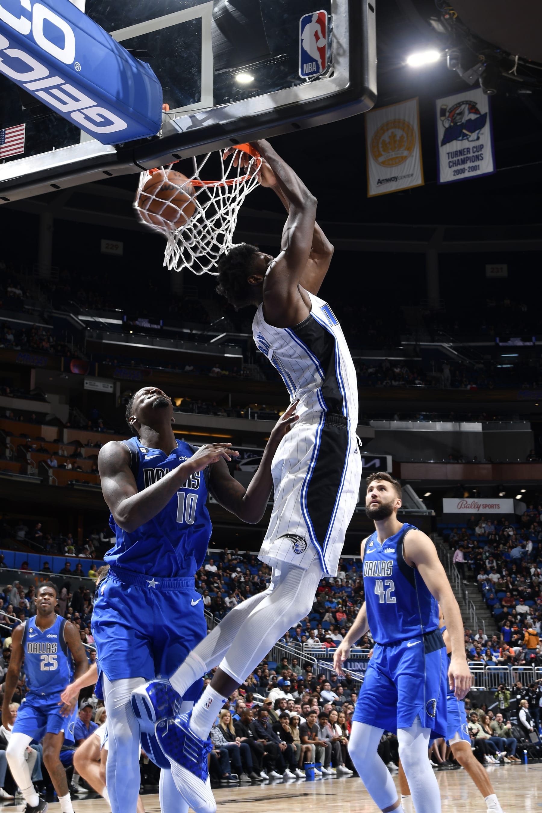 ORLANDO, FL - NOVEMBER 9: Mo Bamba #11 of the Orlando Magic dunks the ball during the game against the Dallas Mavericks on November 9, 2022 at Amway Center in Orlando, Florida. NOTE TO USER: User expressly acknowledges and agrees that, by downloading and or using this photograph, User is consenting to the terms and conditions of the Getty Images License Agreement. Mandatory Copyright Notice: Copyright 2022 NBAE (Photo by Fernando Medina/NBAE via Getty Images)