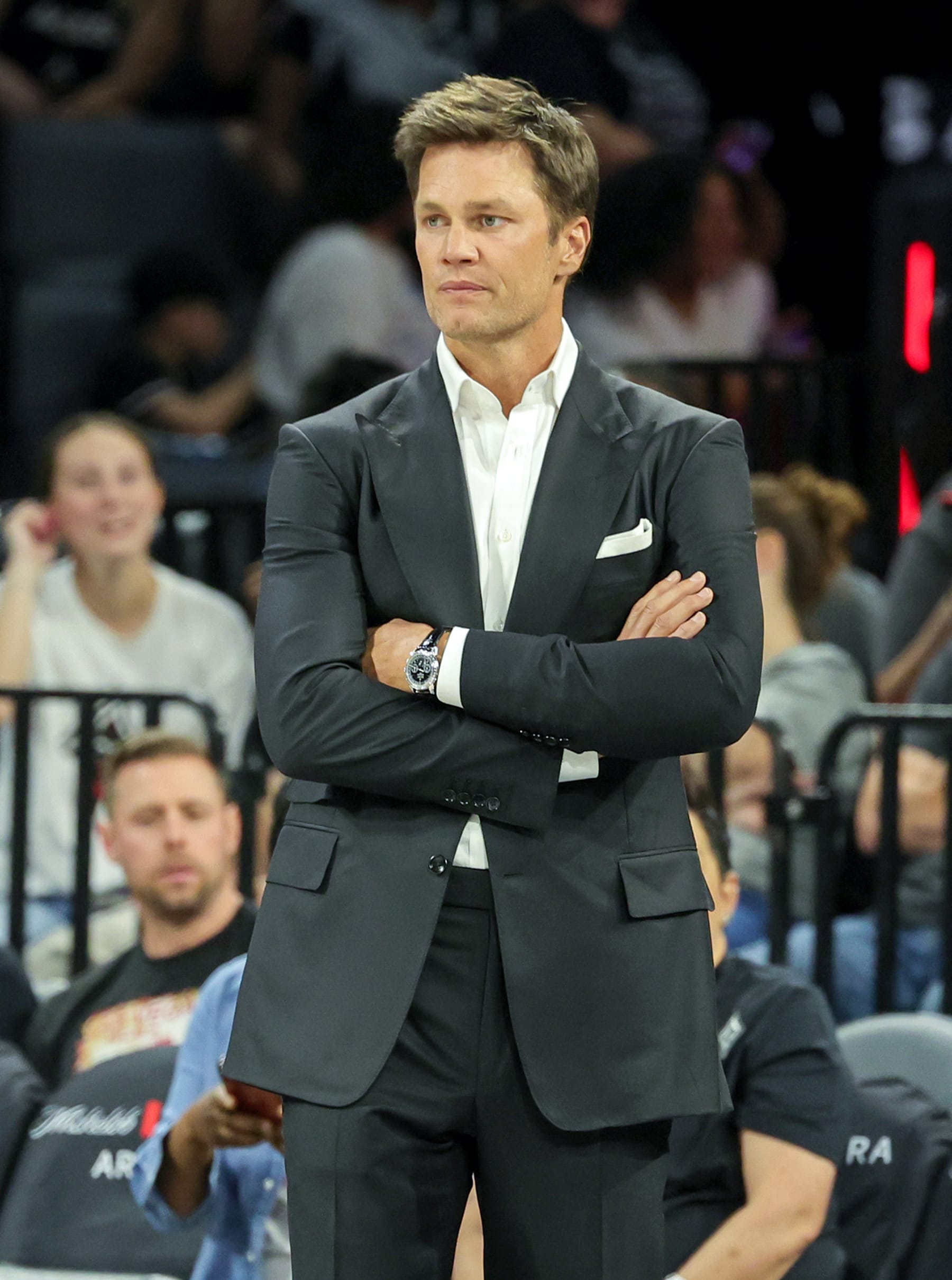 LAS VEGAS, NEVADA - MAY 14: Tom Brady looks on before the Las Vegas Aces' home opener against the Phoenix Mercury at Michelob ULTRA Arena on May 14, 2024 in Las Vegas, Nevada. The Aces defeated the Mercury 89-80. NOTE TO USER: User expressly acknowledges and agrees that, by downloading and or using this photograph, User is consenting to the terms and conditions of the Getty Images License Agreement. (Photo by Ethan Miller/Getty Images)