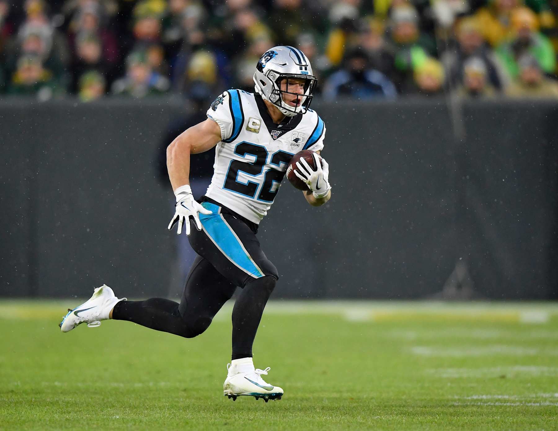 GREEN BAY, WISCONSIN - NOVEMBER 10: Christian McCaffrey #22 of the Carolina Panthers runs with the football against the Green Bay Packers at Lambeau Field on November 10, 2019 in Green Bay, Wisconsin. (Photo by Quinn Harris/Getty Images)