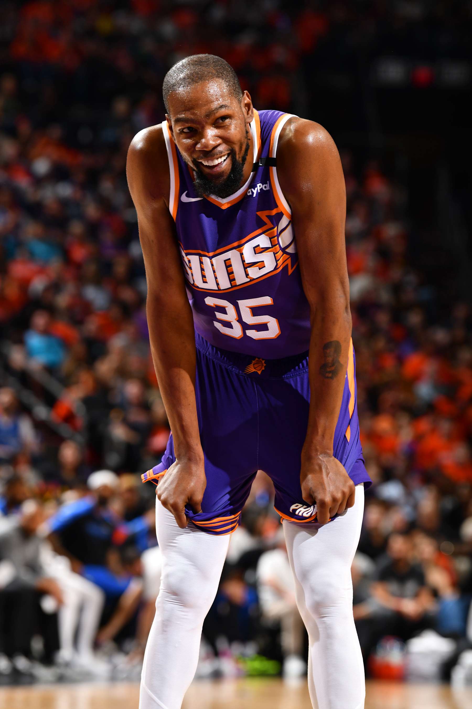 PHOENIX, AZ - OCTOBER 26: Kevin Durant #35 of the Phoenix Suns smiles during the game against the Dallas Mavericks on October 26, 2024 at Footprint Center in Phoenix, Arizona. NOTE TO USER: User expressly acknowledges and agrees that, by downloading and or using this photograph, user is consenting to the terms and conditions of the Getty Images License Agreement. Mandatory Copyright Notice: Copyright 2024 NBAE (Photo by Barry Gossage/NBAE via Getty Images)