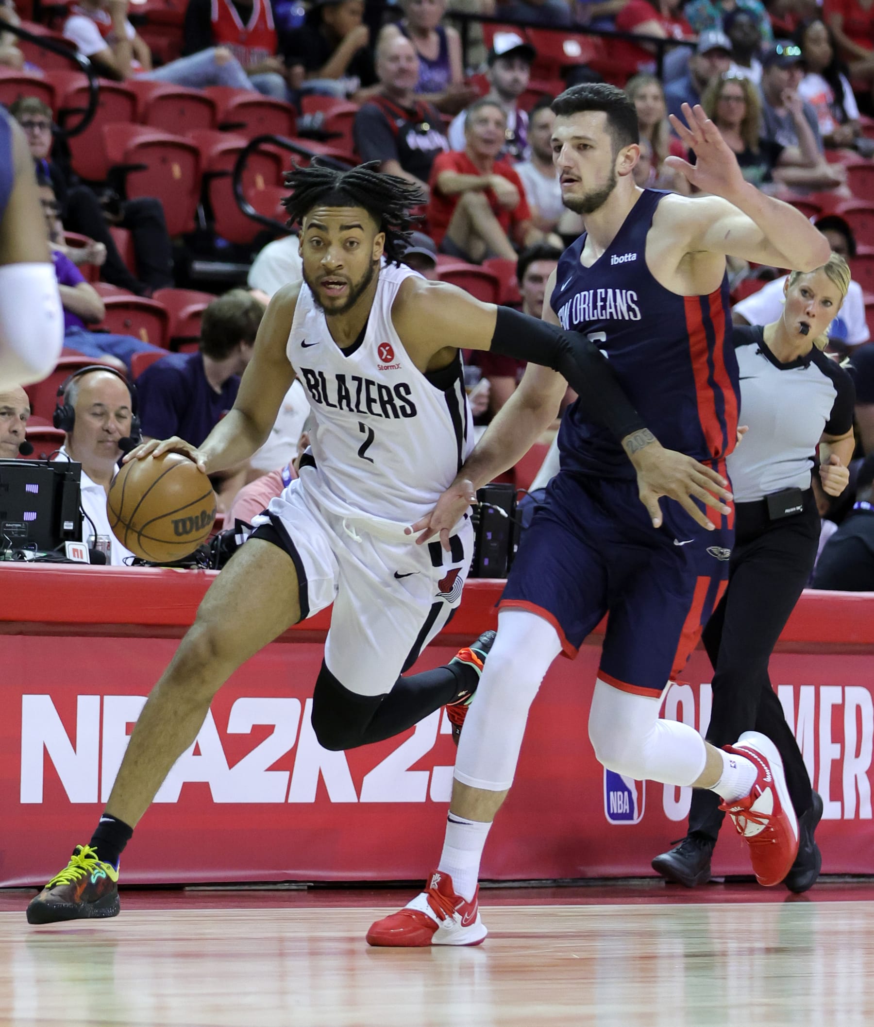 LAS VEGAS, NEVADA - JULY 09: Trendon Watford #2 of the Portland Trail Blazers drives against Karlo Matkovic #45 of the New Orleans Pelicans during the 2022 NBA Summer League at the Thomas & Mack Center on July 09, 2022 in Las Vegas, Nevada. NOTE TO USER: User expressly acknowledges and agrees that, by downloading and or using this photograph, User is consenting to the terms and conditions of the Getty Images License Agreement. (Photo by Ethan Miller/Getty Images)
