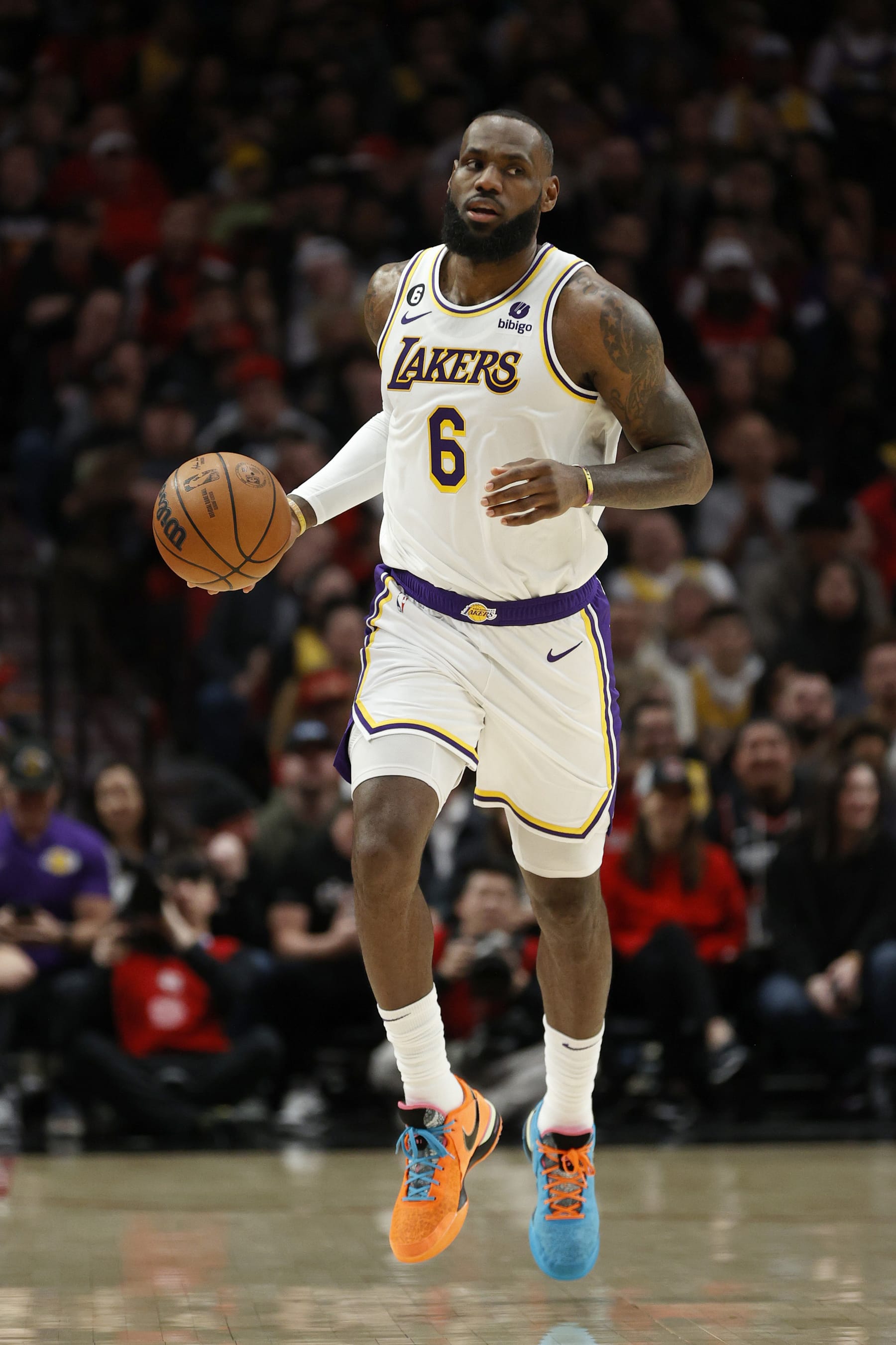 PORTLAND, OREGON - JANUARY 22: LeBron James #6 of the Los Angeles Lakers dribbles against the Portland Trail Blazers during the first half at Moda Center on January 22, 2023 in Portland, Oregon. NOTE TO USER: User expressly acknowledges and agrees that, by downloading and/or using this photograph, User is consenting to the terms and conditions of the Getty Images License Agreement. (Photo by Steph Chambers/Getty Images)