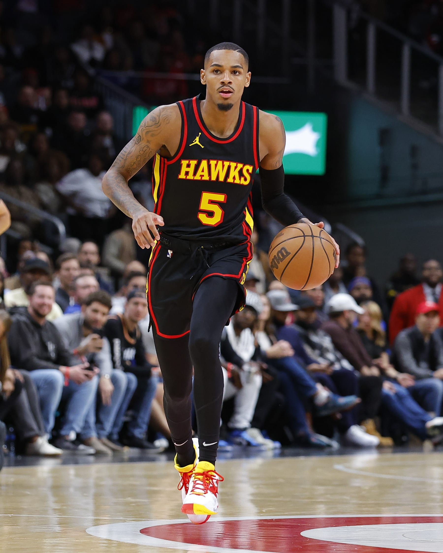 ATLANTA, GEORGIA - NOVEMBER 15: Dejounte Murray #5 of the Atlanta Hawks drives downcourt during the fourth quarter against the New York Knicks at State Farm Arena on November 15, 2023 in Atlanta, Georgia. NOTE TO USER: User expressly acknowledges and agrees that, by downloading and or using this photograph, User is consenting to the terms and conditions of the Getty Images License Agreement. (Photo by Todd Kirkland/Getty Images)