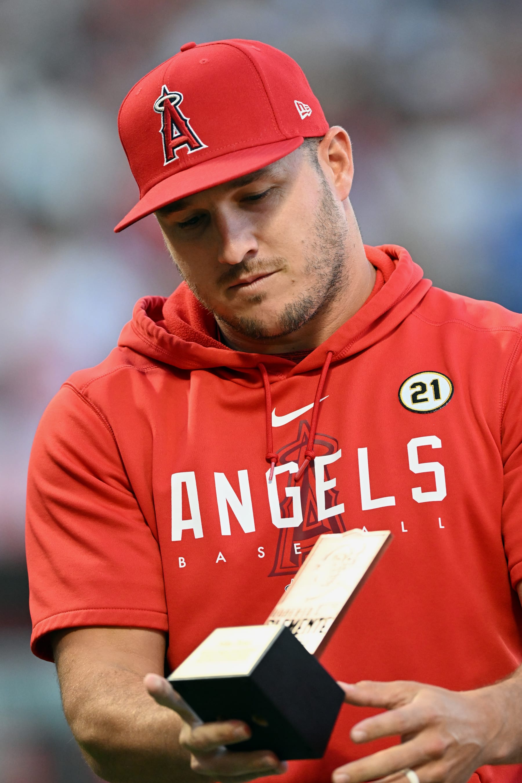 ANAHEIM, CA - SEPTEMBER 15: Los Angeles Angels outfielder Mike Trout (27) excepts the 2023 Roberto Clemente award on the field before the start of an MLB baseball game against the Detroit Tigers played on September 15, 2023 at Angel Stadium in Anaheim, CA. (Photo by John Cordes/Icon Sportswire via Getty Images)