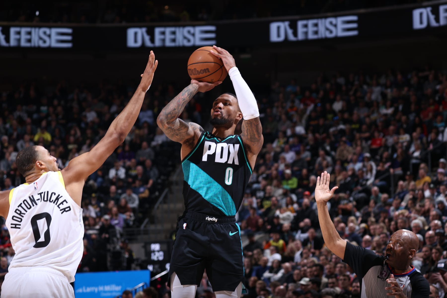 SALT LAKE CITY, UT - MARCH 22: Damian Lillard #0 of the Portland Trail Blazers shoots the ball during the game against the Utah Jazz on March 22, 2023 at vivint.SmartHome Arena in Salt Lake City, Utah. NOTE TO USER: User expressly acknowledges and agrees that, by downloading and or using this Photograph, User is consenting to the terms and conditions of the Getty Images License Agreement. Mandatory Copyright Notice: Copyright 2023 NBAE (Photo by Melissa Majchrzak/NBAE via Getty Images)