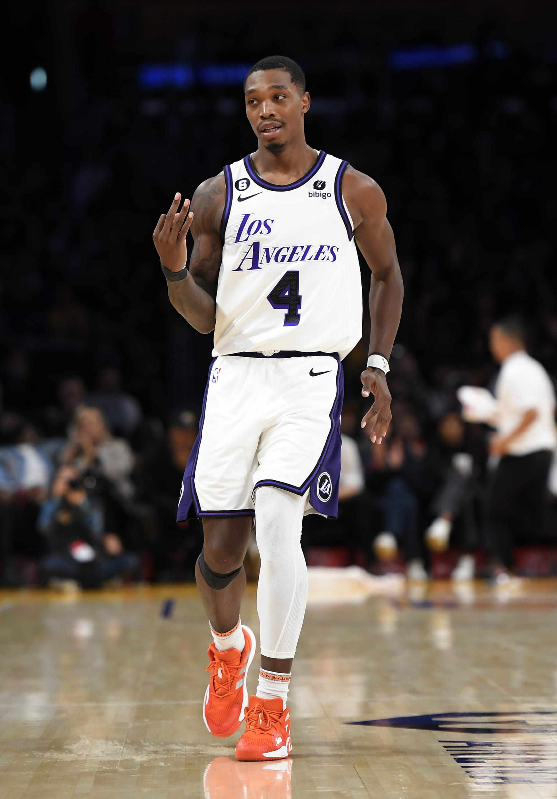 LOS ANGELES, CA - NOVEMBER 13: Lonnie Walker IV #4 of the Los Angeles Lakers reacts after scoring a three-point basket against Brooklyn Nets during the second half of the game at Crypto.com Arena on November 13, 2022 in Los Angeles, California. NOTE TO USER: User expressly acknowledges and agrees that, by downloading and or using this photograph, User is consenting to the terms and conditions of the Getty Images License Agreement. (Photo by Kevork Djansezian/Getty Images)