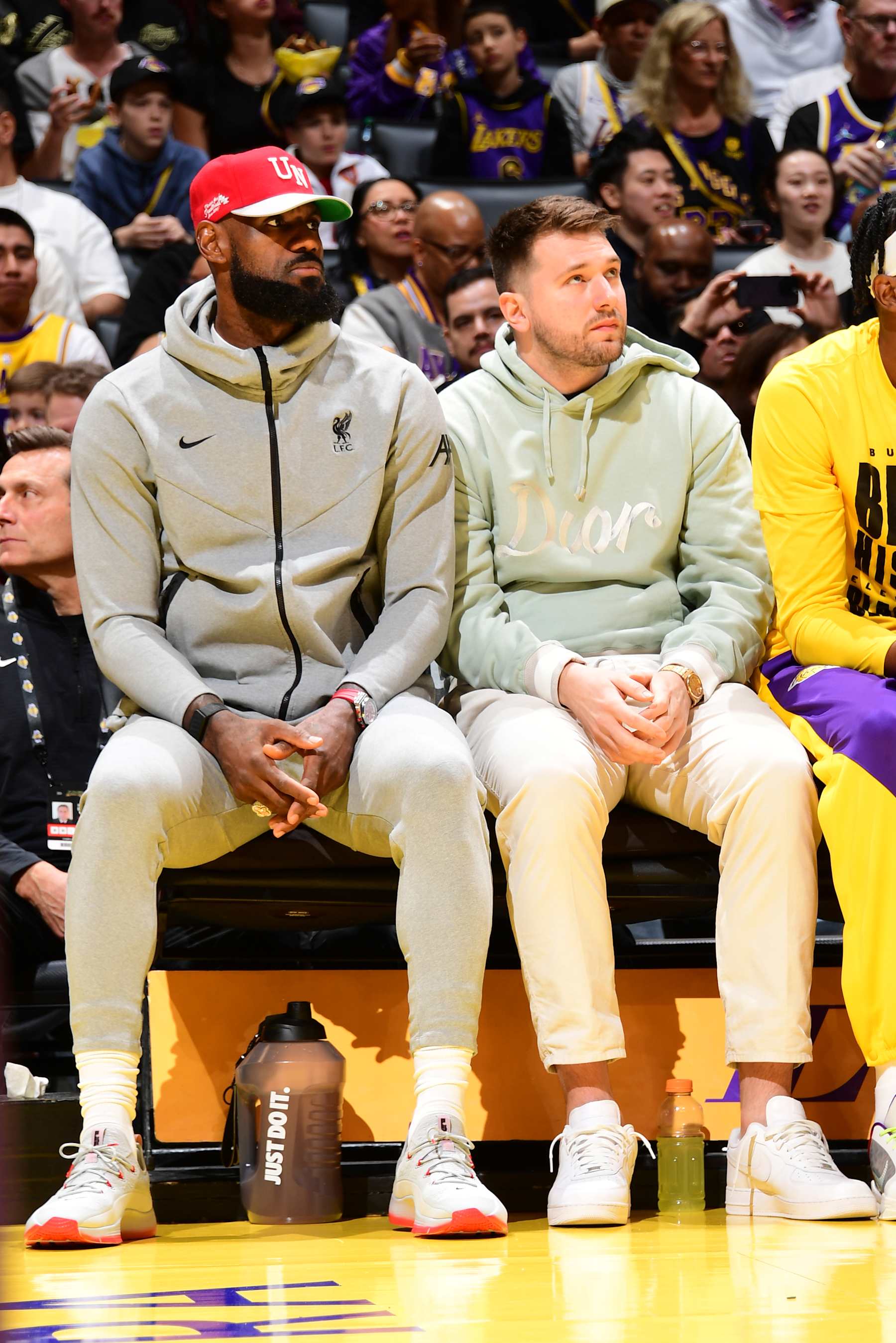 LOS ANGELES, CA - FEBRUARY 8: LeBron James #23 and Luka Doncic #77 of the Los Angeles Lakers looks on during the game against the Indiana Pacers on February 8, 2025 at Crypto.Com Arena in Los Angeles, California. NOTE TO USER: User expressly acknowledges and agrees that, by downloading and/or using this Photograph, user is consenting to the terms and conditions of the Getty Images License Agreement. Mandatory Copyright Notice: Copyright 2025 NBAE (Photo by Adam Pantozzi/NBAE via Getty Images)