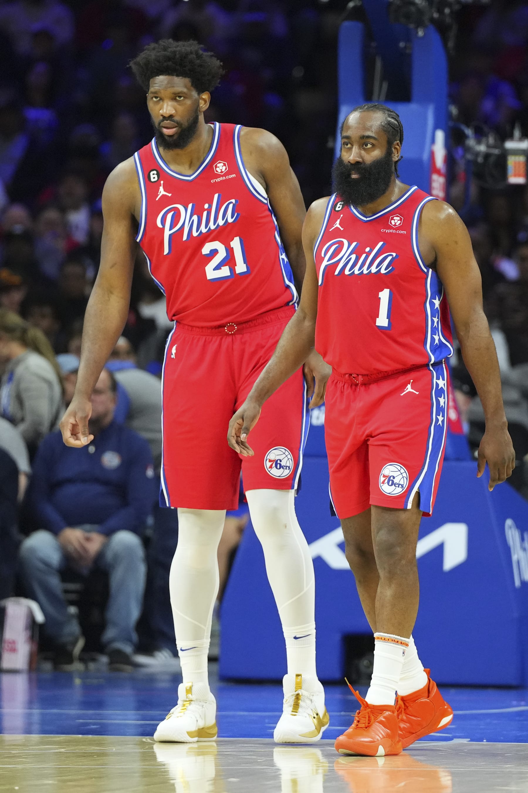 PHILADELPHIA, PA - MARCH 31: James Harden #1 and Joel Embiid #21 of the Philadelphia 76ers look on against the Toronto Raptors at the Wells Fargo Center on March 31, 2023 in Philadelphia, Pennsylvania. The 76ers defeated the Raptors 117-110. NOTE TO USER: User expressly acknowledges and agrees that, by downloading and or using this photograph, User is consenting to the terms and conditions of the Getty Images License Agreement. (Photo by Mitchell Leff/Getty Images)