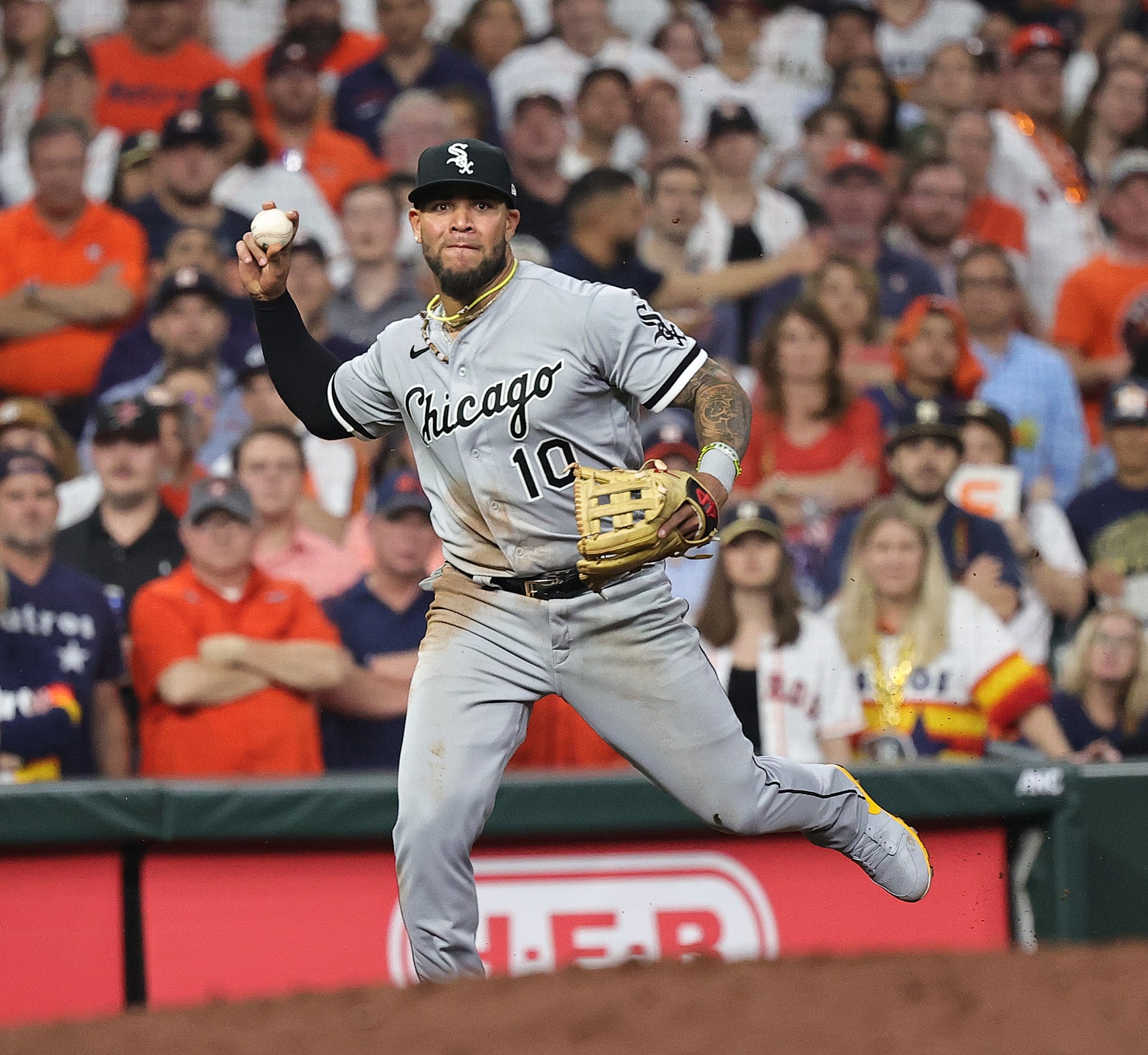 HOUSTON, TEXAS - MARCH 30: Yoan Moncada #10 of the Chicago White Sox throws out Jose Abreu #79 of the Houston Astros in the ninth inning on Opening Day at Minute Maid Park on March 30, 2023 in Houston, Texas. (Photo by Bob Levey/Getty Images)