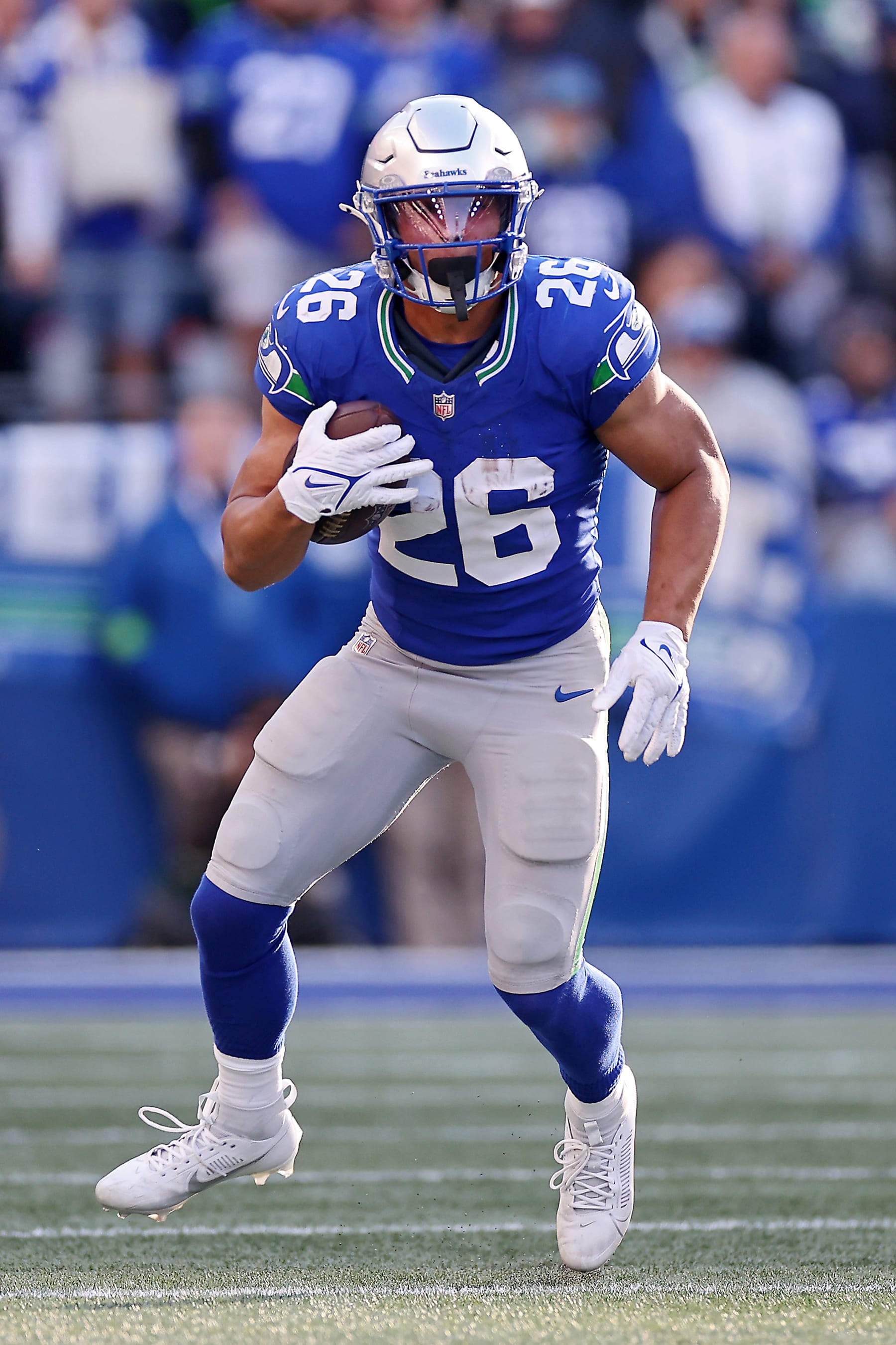 SEATTLE, WASHINGTON - OCTOBER 29: Zach Charbonnet #26 of the Seattle Seahawks runs with the ball during the second half of a game against the Cleveland Browns at Lumen Field on October 29, 2023 in Seattle, Washington. (Photo by Steph Chambers/Getty Images)