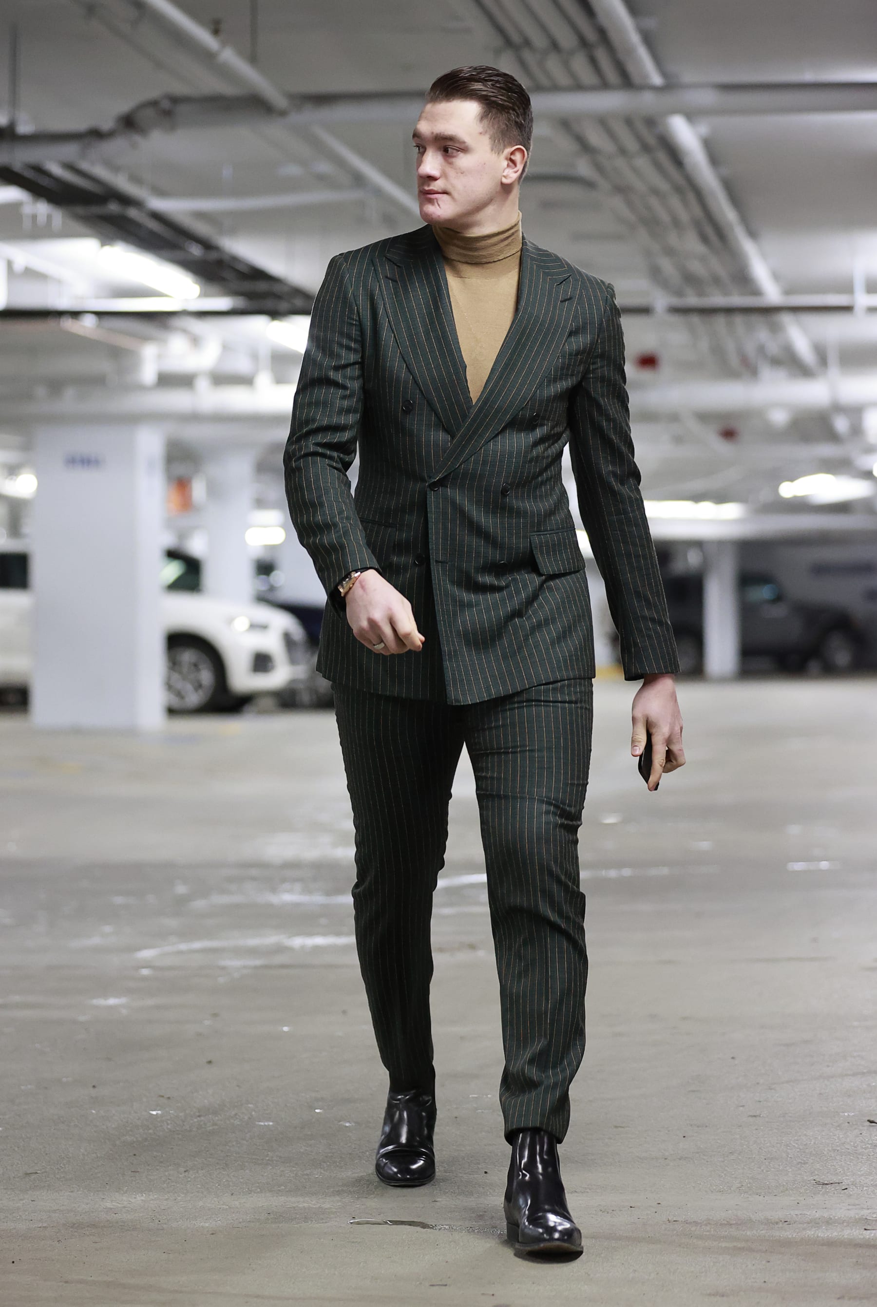 VANCOUVER, CANADA - JANUARY 20: Nikita Zadorov #91 of the Vancouver Canucks walks to the Canucks dressing room before their NHL game against the Toronto Maple Leafs at Rogers Arena on January 20, 2024 in Vancouver, British Columbia, Canada. (Photo by Jeff Vinnick/NHLI via Getty Images) VANCOUVER, CANADA - JANUARY 20: Nikita Zadorov #91 of the Vancouver Canucks walks to the Canucks dressing room before their NHL game against the Toronto Maple Leafs at Rogers Arena on January 20, 2024 in Vancouver, British Columbia, Canada. (Photo by Jeff Vinnick/NHLI via Getty Images)