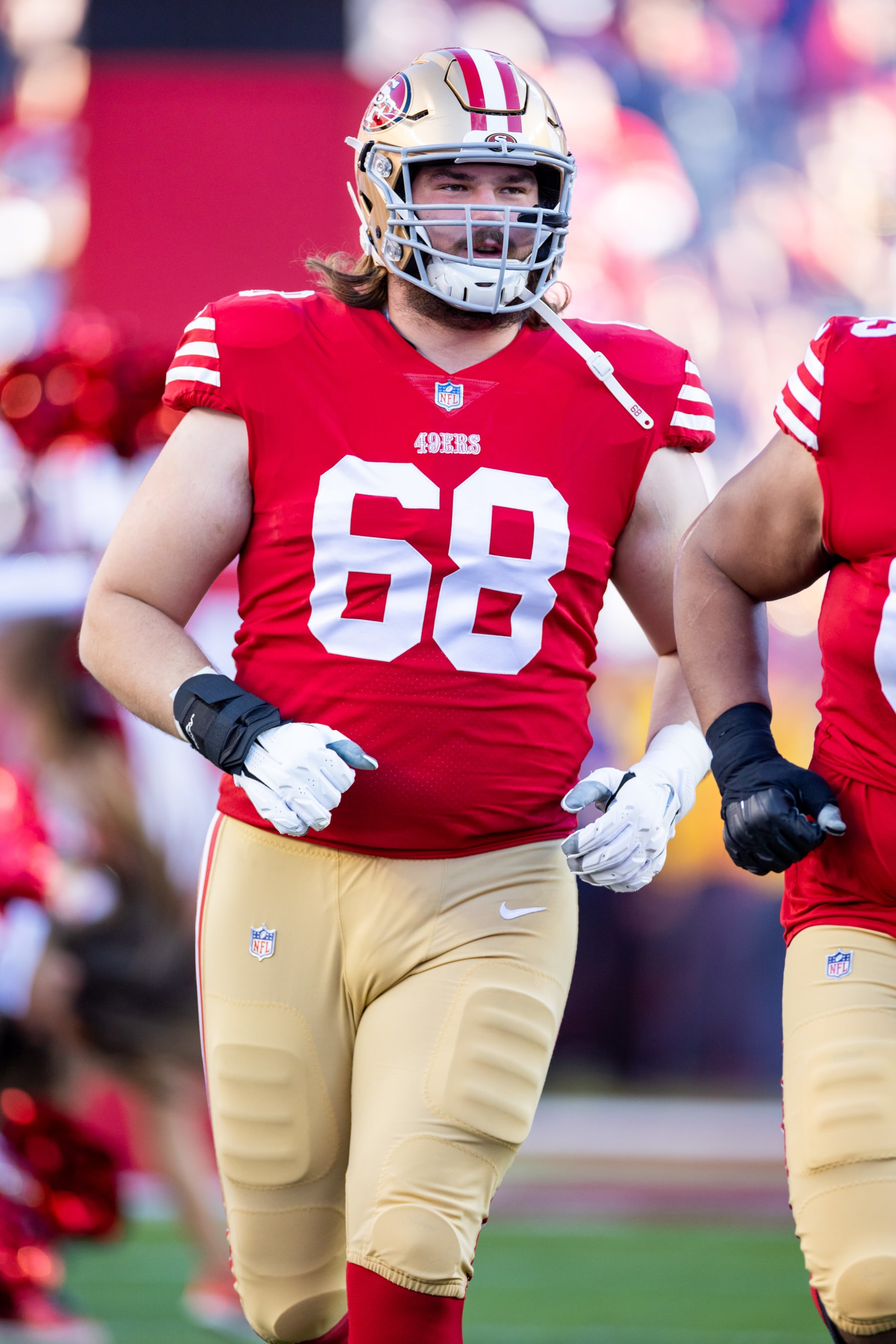 SANTA CLARA, CA - JANUARY 22: San Francisco 49ers offensive tackle Colton McKivitz (68) runs onto the field before the NFL NFC Divisional Playoff game between the Dallas Cowboys and San Francisco 49ers at Levis Stadium in Santa Clara, CA. (Photo by Bob Kupbens/Icon Sportswire via Getty Images)