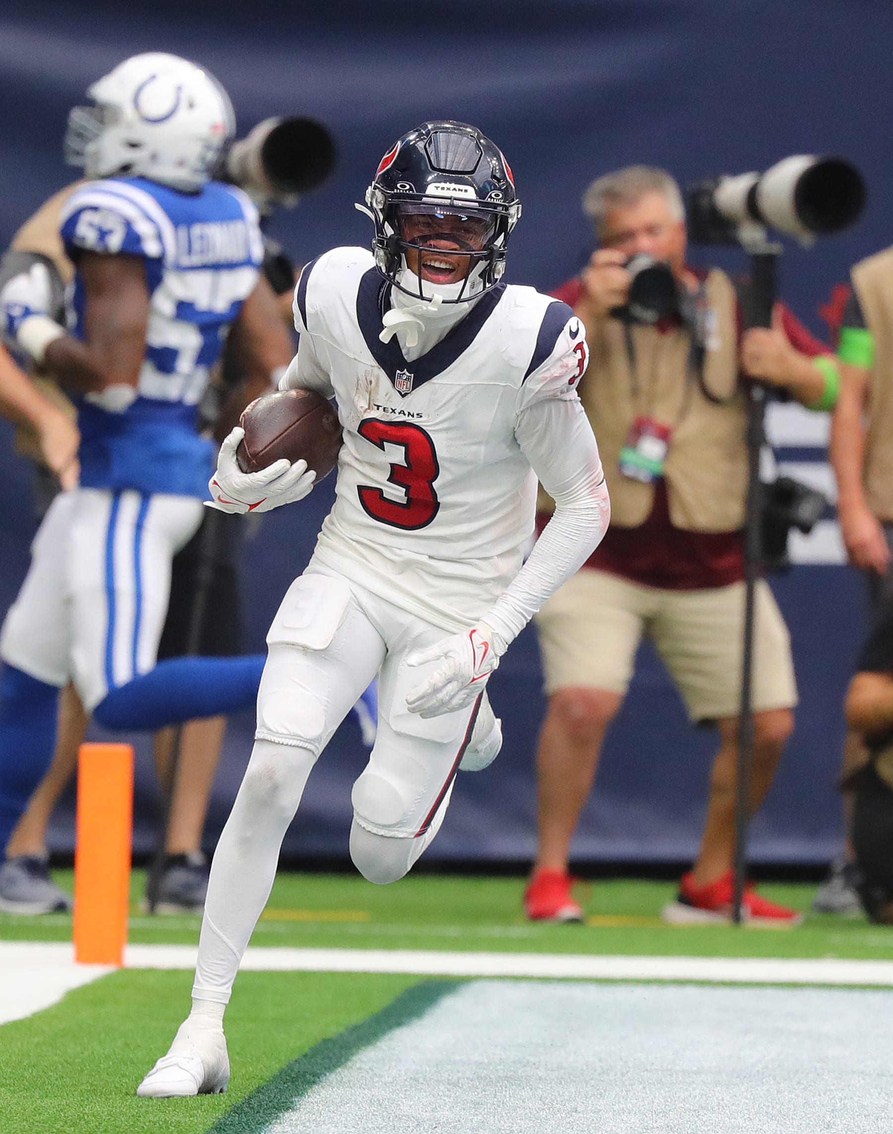 HOUSTON, TEXAS - SEPTEMBER 17: Tank Dell #3 of the Houston Texans scores a touchdown during the second half against the Indianapolis Colts at NRG Stadium on September 17, 2023 in Houston, Texas. (Photo by Bob Levey/Getty Images) HOUSTON, TEXAS - SEPTEMBER 17: Tank Dell #3 of the Houston Texans scores a touchdown during the second half against the Indianapolis Colts at NRG Stadium on September 17, 2023 in Houston, Texas. (Photo by Bob Levey/Getty Images)
