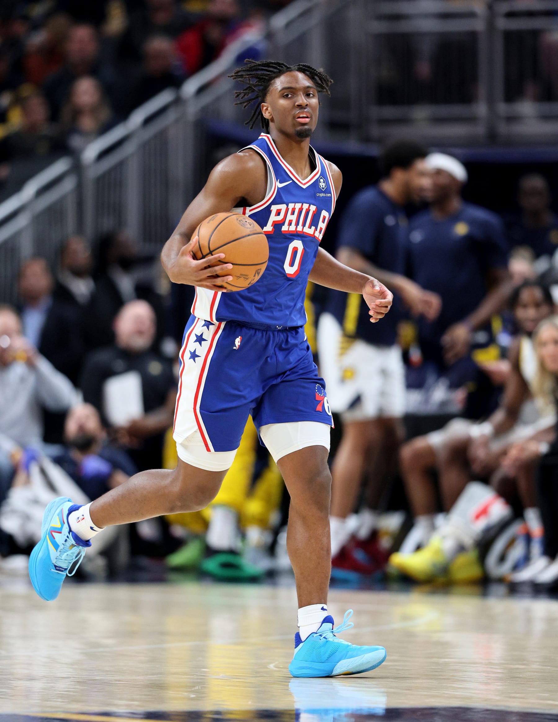 INDIANAPOLIS, INDIANA - JANUARY 25: Tyrese Maxey #0 of the Philadelphia 76ers dribbles the ball in the first half against the Indiana Pacers at Gainbridge Fieldhouse on January 25, 2024 in Indianapolis, Indiana.    NOTE TO USER: User expressly acknowledges and agrees that, by downloading and or using this photograph, User is consenting to the terms and conditions of the Getty Images License Agreement.  (Photo by Andy Lyons/Getty Images)