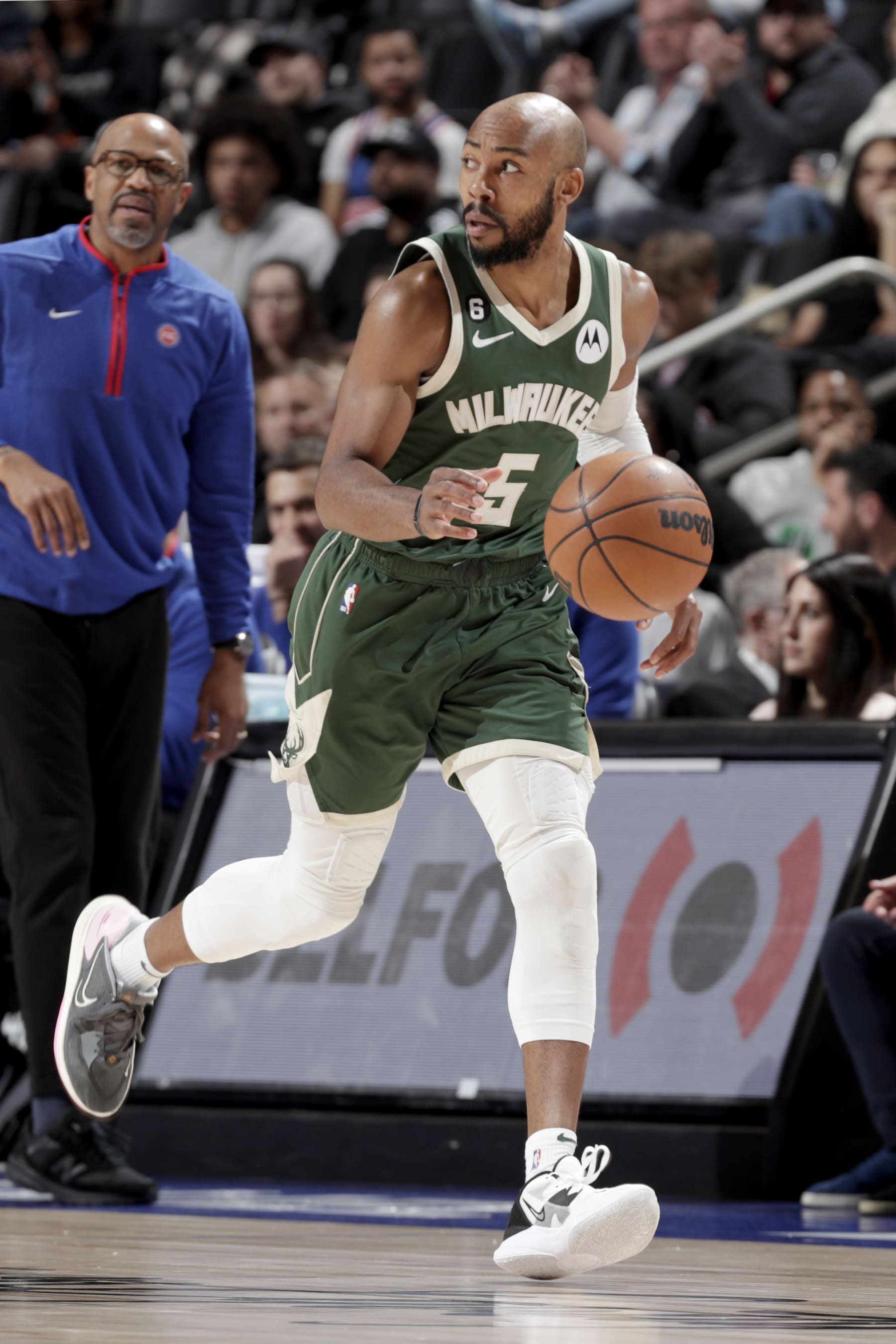 DETROIT, MI - MARCH 27:  Jevon Carter #5 of the Milwaukee Bucks dribbles the ball against the Detroit Pistons on March 27, 2023 at Little Caesars Arena in Detroit, Michigan. NOTE TO USER: User expressly acknowledges and agrees that, by downloading and/or using this photograph, User is consenting to the terms and conditions of the Getty Images License Agreement. Mandatory Copyright Notice: Copyright 2023 NBAE (Photo by Brian Sevald/NBAE via Getty Images)