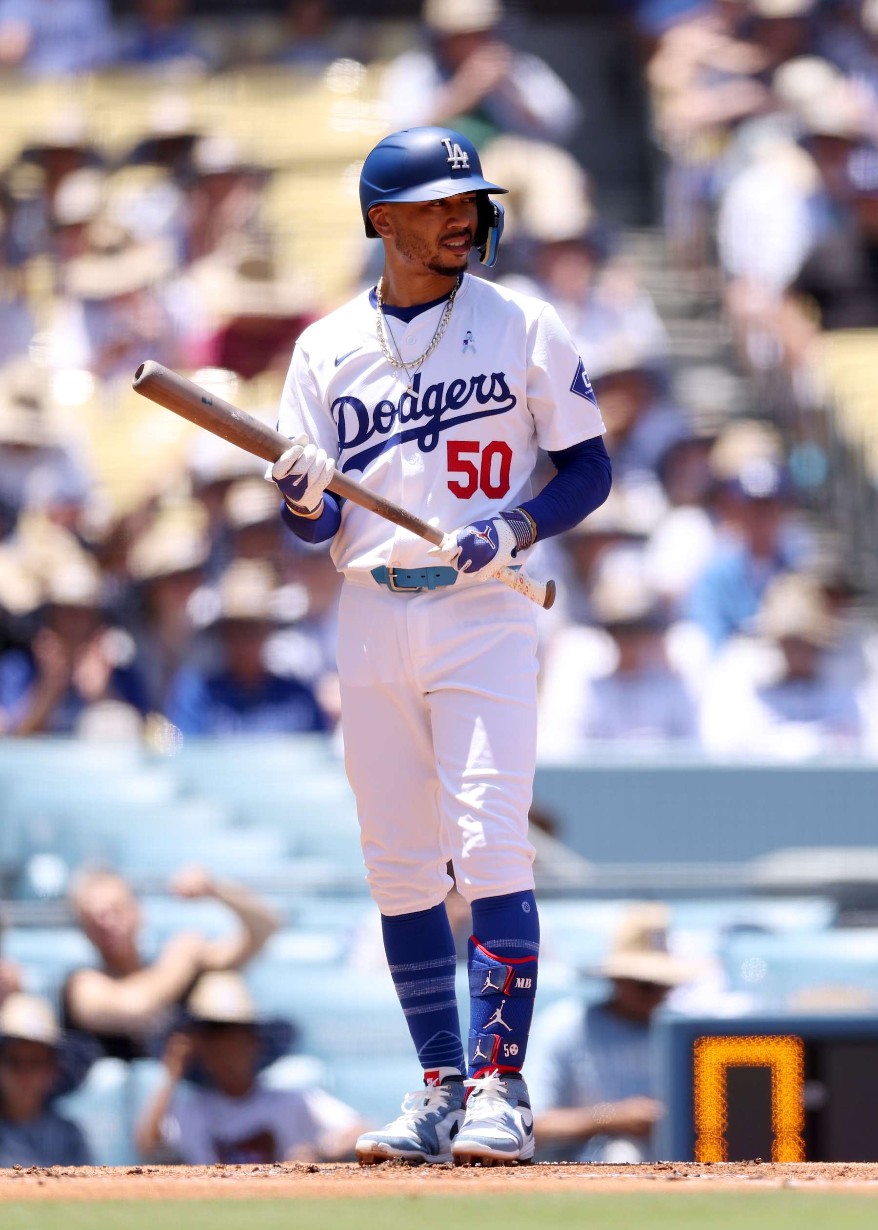 LOS ANGELES, CALIFORNIA - JUNE 16: Mookie Betts #50 of the Los Angeles Dodgers looks on at bat during the first inning against the Kansas City Royals at Dodger Stadium on June 16, 2024 in Los Angeles, California. (Photo by Katelyn Mulcahy/Getty Images)
