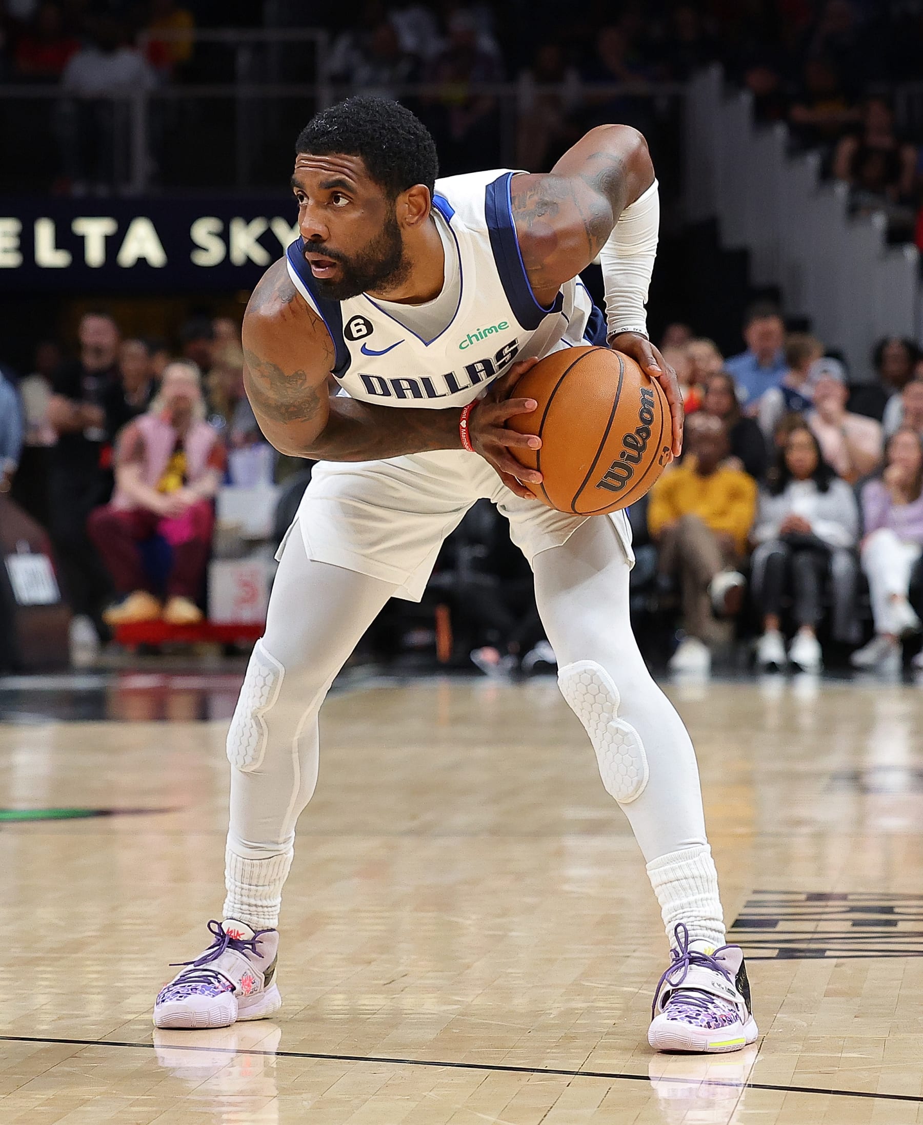 ATLANTA, GEORGIA - APRIL 02:  Kyrie Irving #2 of the Dallas Mavericks looks to drive against the Atlanta Hawks during the second quarter at State Farm Arena on April 02, 2023 in Atlanta, Georgia.  NOTE TO USER: User expressly acknowledges and agrees that, by downloading and or using this photograph, User is consenting to the terms and conditions of the Getty Images License Agreement.  (Photo by Kevin C. Cox/Getty Images)