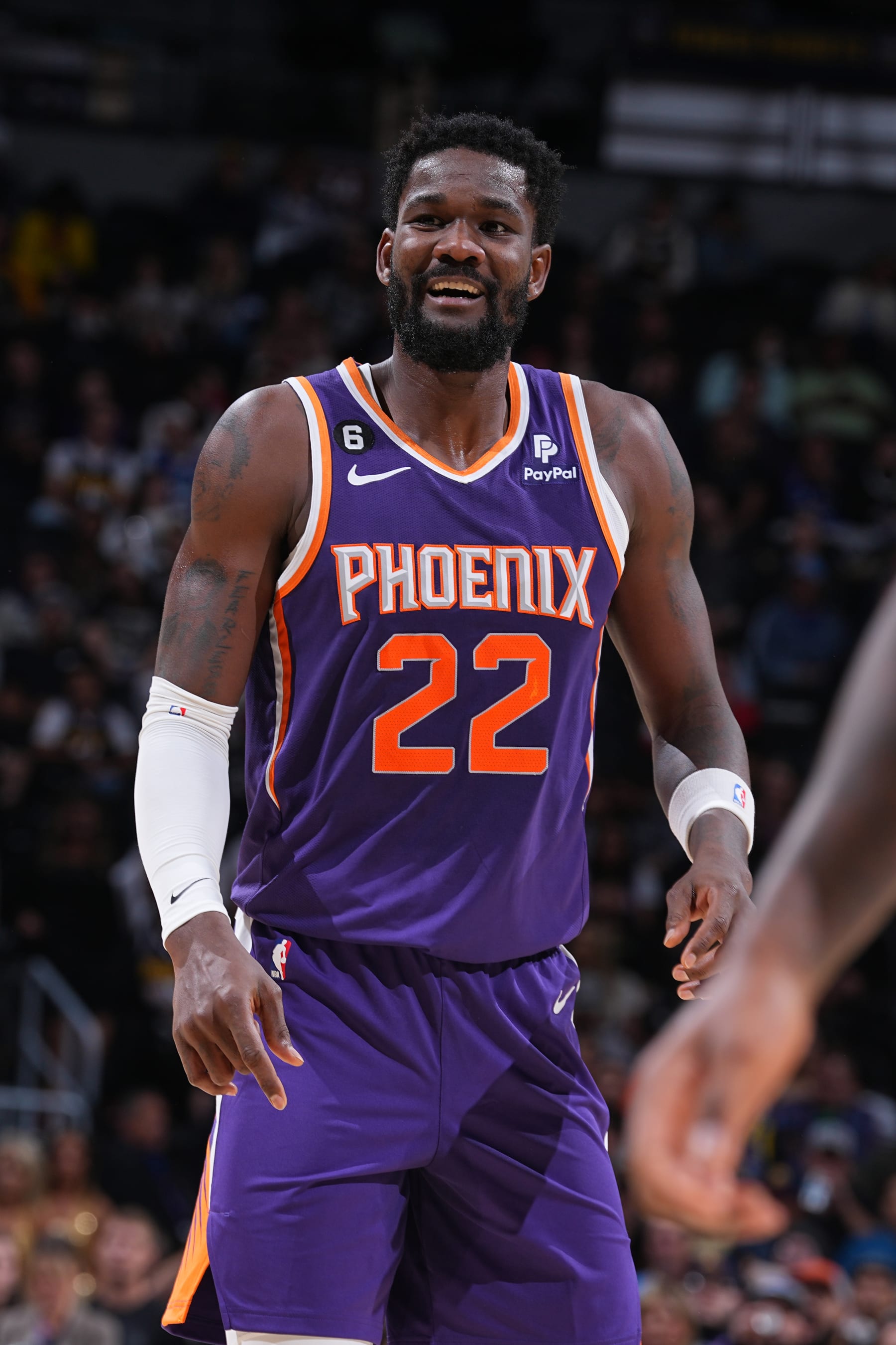DENVER, CO - OCTOBER 10: Deandre Ayton #22 of the Phoenix Suns smiles during the game against the Denver Nuggets on October 10, 2022 at the Ball Arena in Denver, Colorado. NOTE TO USER: User expressly acknowledges and agrees that, by downloading and/or using this Photograph, user is consenting to the terms and conditions of the Getty Images License Agreement. Mandatory Copyright Notice: Copyright 2022 NBAE (Photo by Bart Young/NBAE via Getty Images)