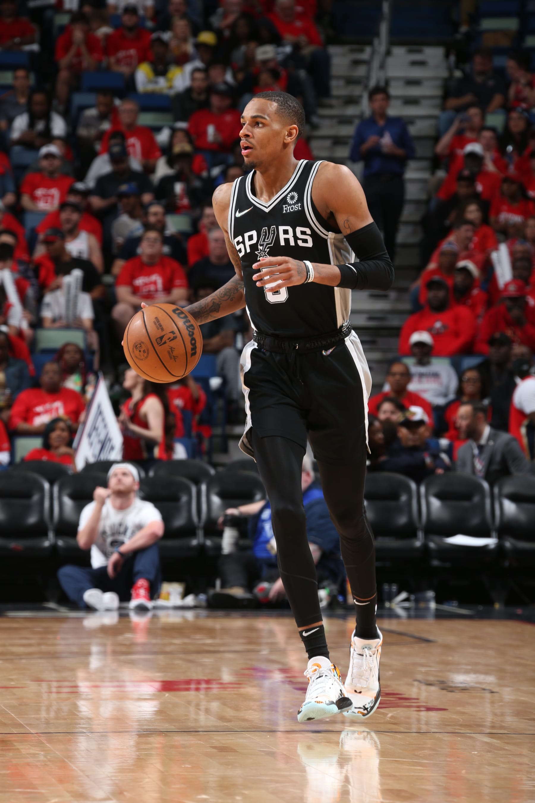 NEW ORLEANS, LA - APRIL 13: Dejounte Murray #5 of the San Antonio Spurs handles the ball during the game against the New Orleans Pelicans on April 13, 2022 at the Smoothie King Center in New Orleans, Louisiana. NOTE TO USER: User expressly acknowledges and agrees that, by downloading and or using this Photograph, user is consenting to the terms and conditions of the Getty Images License Agreement. Mandatory Copyright Notice: Copyright 2022 NBAE (Photo by Layne Murdoch Jr./NBAE via Getty Images)