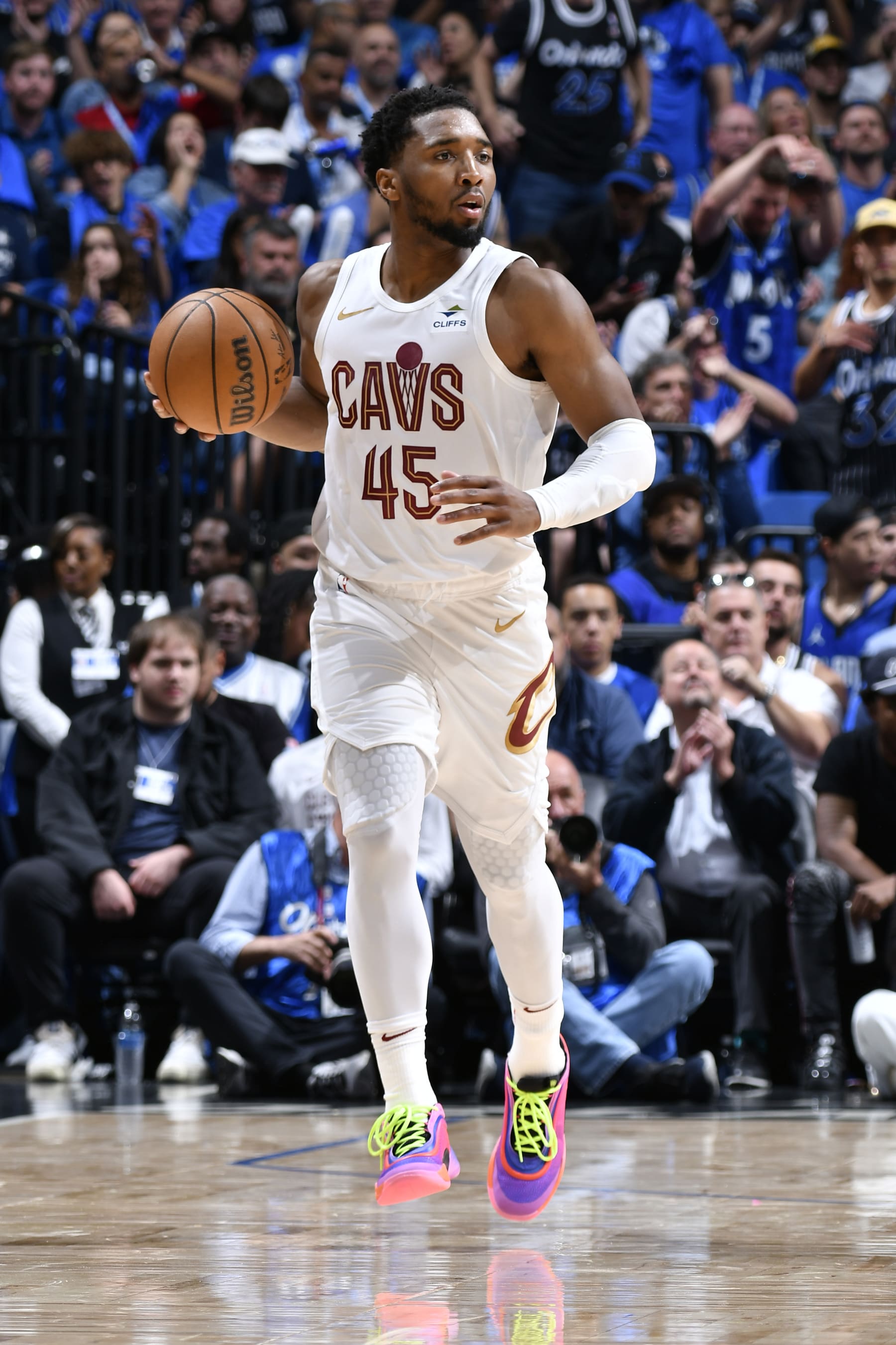 ORLANDO, FL - APRIL 27: Donovan Mitchell #45 of the Cleveland Cavaliers dribbles the ball during the game against the Orlando Magic during Round 1 Game 4 of the 2024 NBA Playoffs on April 27, 2024 at the Kia Center in Orlando, Florida. NOTE TO USER: User expressly acknowledges and agrees that, by downloading and or using this photograph, User is consenting to the terms and conditions of the Getty Images License Agreement. Mandatory Copyright Notice: Copyright 2024 NBAE (Photo by Fernando Medina/NBAE via Getty Images)