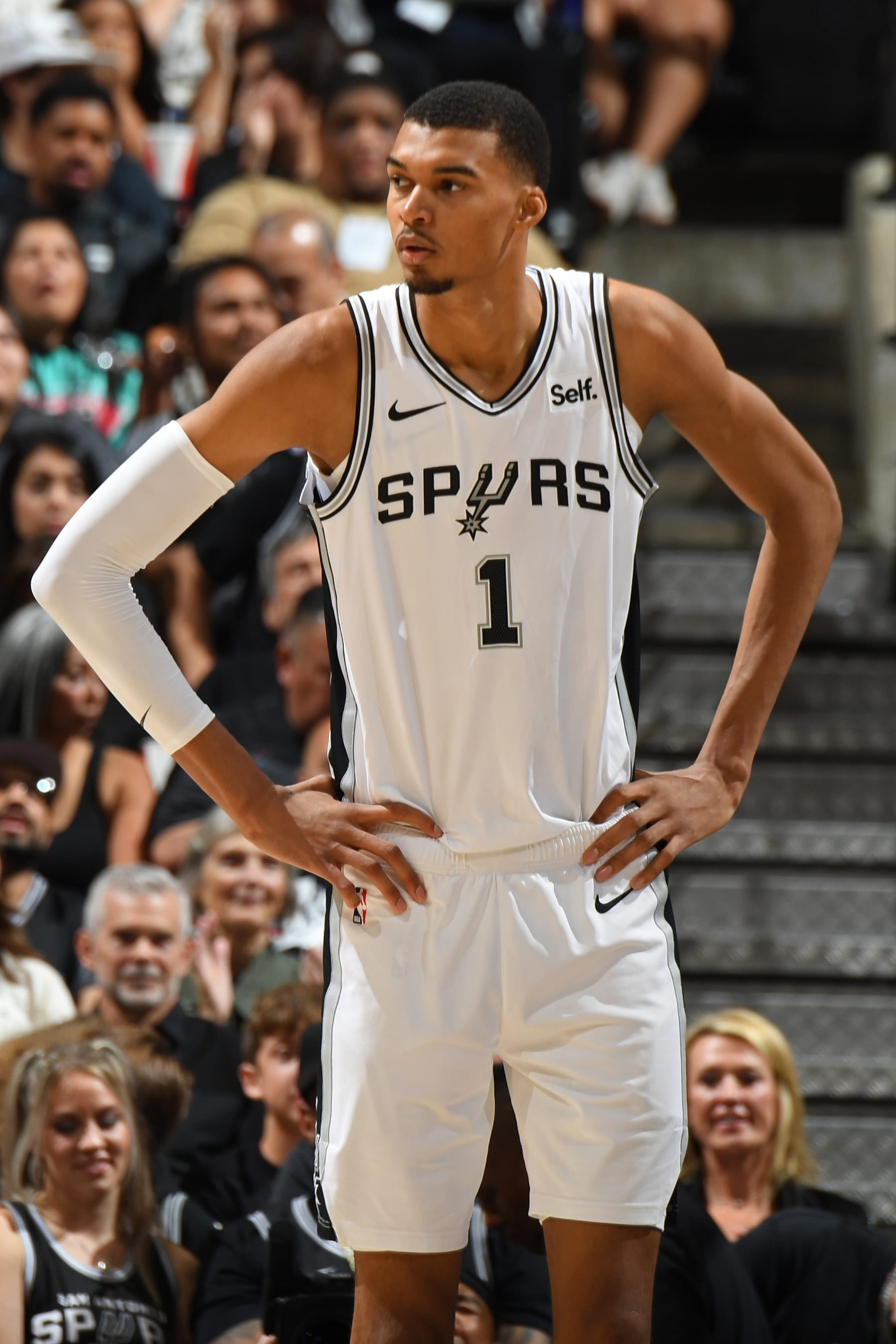 SAN ANTONIO, TX - OCTOBER 25: Victor Wembanyama #1 of the San Antonio Spurs looks on during the game against the Dallas Mavericks on October 25, 2023 at the Frost Bank Center in San Antonio, Texas. NOTE TO USER: User expressly acknowledges and agrees that, by downloading and or using this photograph, user is consenting to the terms and conditions of the Getty Images License Agreement. Mandatory Copyright Notice: Copyright 2023 NBAE (Photos by Andrew D. Bernstein/NBAE via Getty Images)