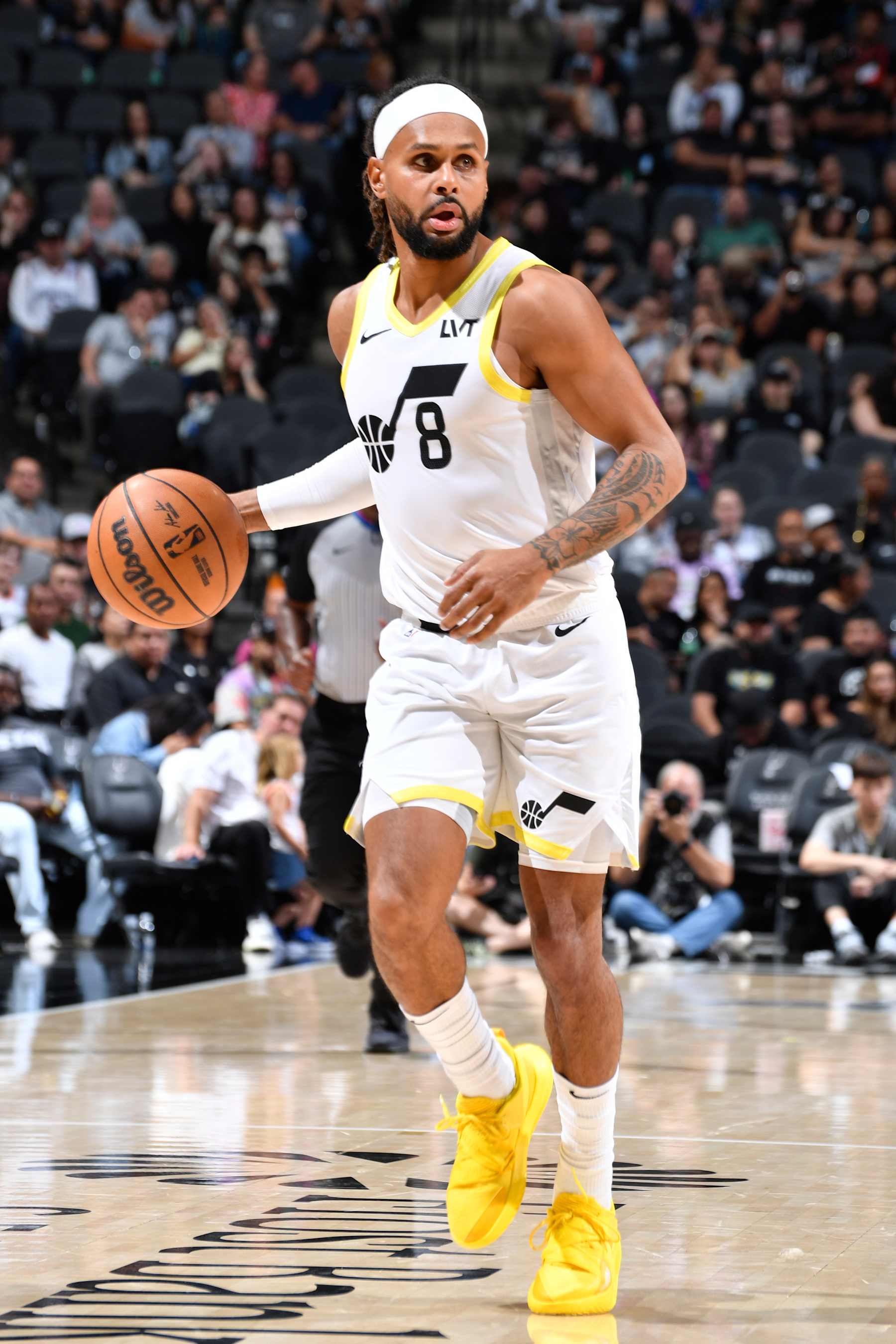 SAN ANTONIO, TX - NOVEMBER 9: Patty Mills #8 of the Utah Jazz dribbles the ball during the game against the San Antonio Spurs on November 9, 2024 at the Frost Bank Center in San Antonio, Texas. NOTE TO USER: User expressly acknowledges and agrees that, by downloading and or using this photograph, user is consenting to the terms and conditions of the Getty Images License Agreement. Mandatory Copyright Notice: Copyright 2024 NBAE (Photos by Logan Riely/NBAE via Getty Images)