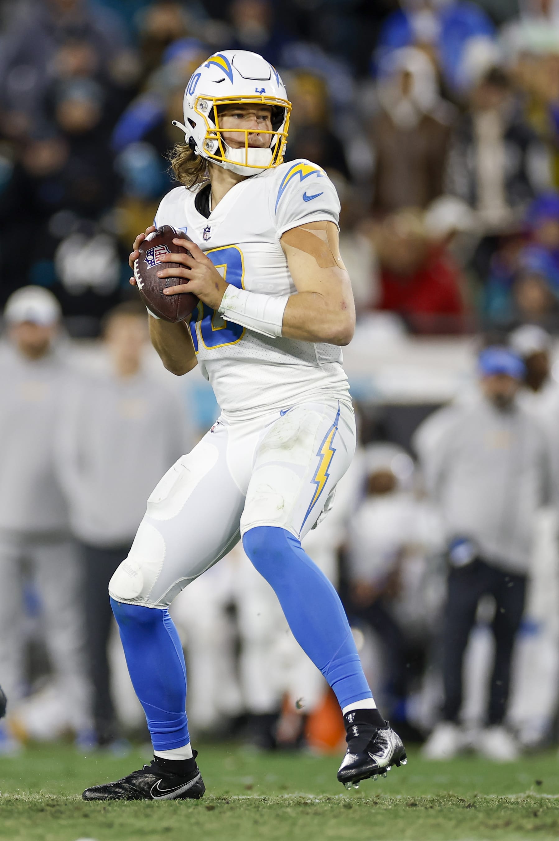 JACKSONVILLE, FL - JANUARY 14: Los Angeles Chargers quarterback Justin Herbert (10) throws a pass during the game between the Los Angeles Chargers and the Jacksonville Jaguars on January 14, 2023 at TIAA Bank Field in Jacksonville, Fl. (Photo by David Rosenblum/Icon Sportswire via Getty Images)